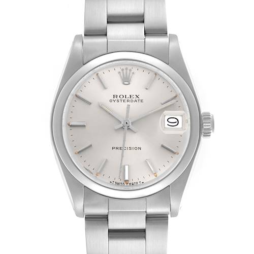 The Rolex Date watch is shown from a straight-on angle, highlighting its dial, hour markers, hands, date window, and crown.