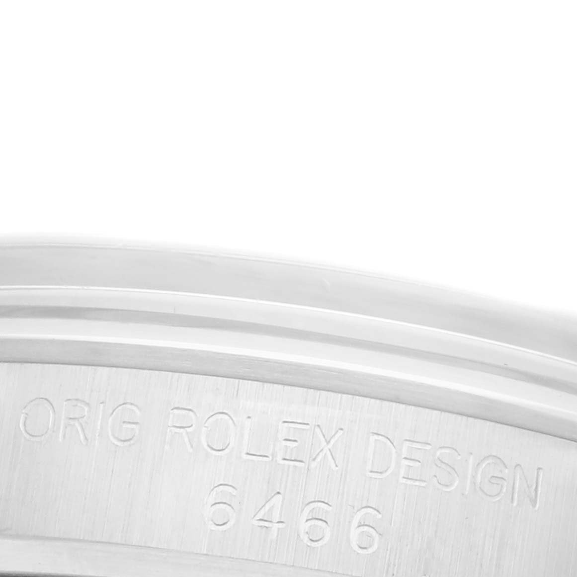 The image shows a close-up of the inner case engraving for a Rolex Date 6466 Women's Stainless Steel Silver Dial 6466 Women's Stainless Steel Silver Dial model.