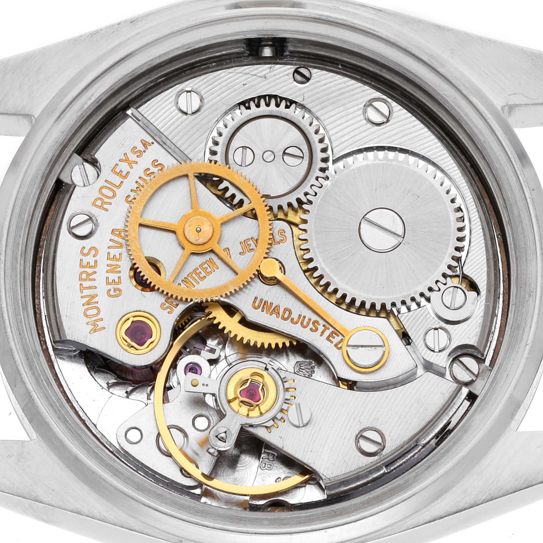 The image shows the movement of a Rolex Date 6466 Women's Stainless Steel Silver Dial 6466 Women's Stainless Steel Silver Dial watch, focusing on its gears and mechanisms from a top-down angle.