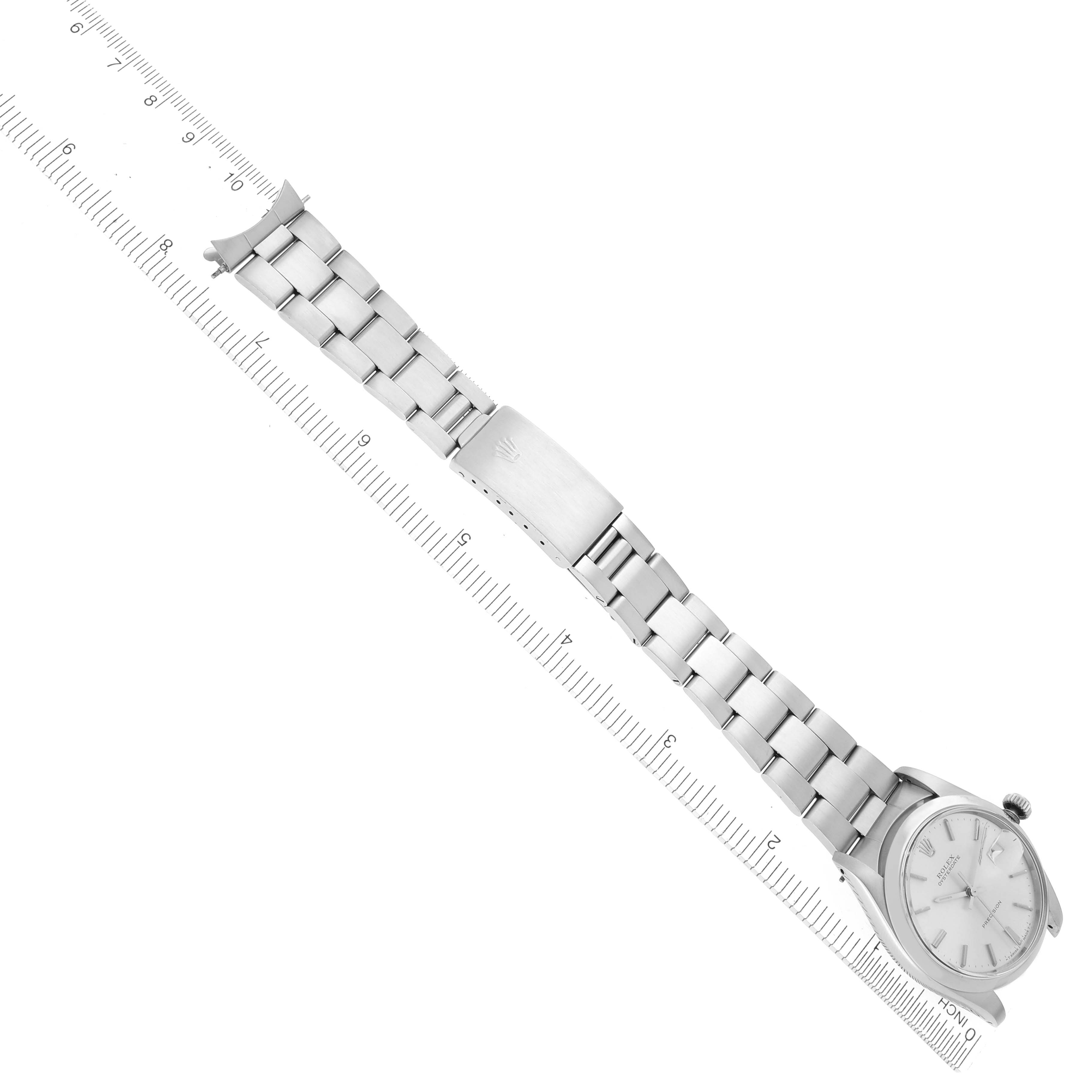 The Rolex Date 6694 Men's Stainless Steel Silver Dial 6694 Men's Stainless Steel Silver Dial model watch is shown from a top-down angle, displaying the bracelet, clasp, and full face.