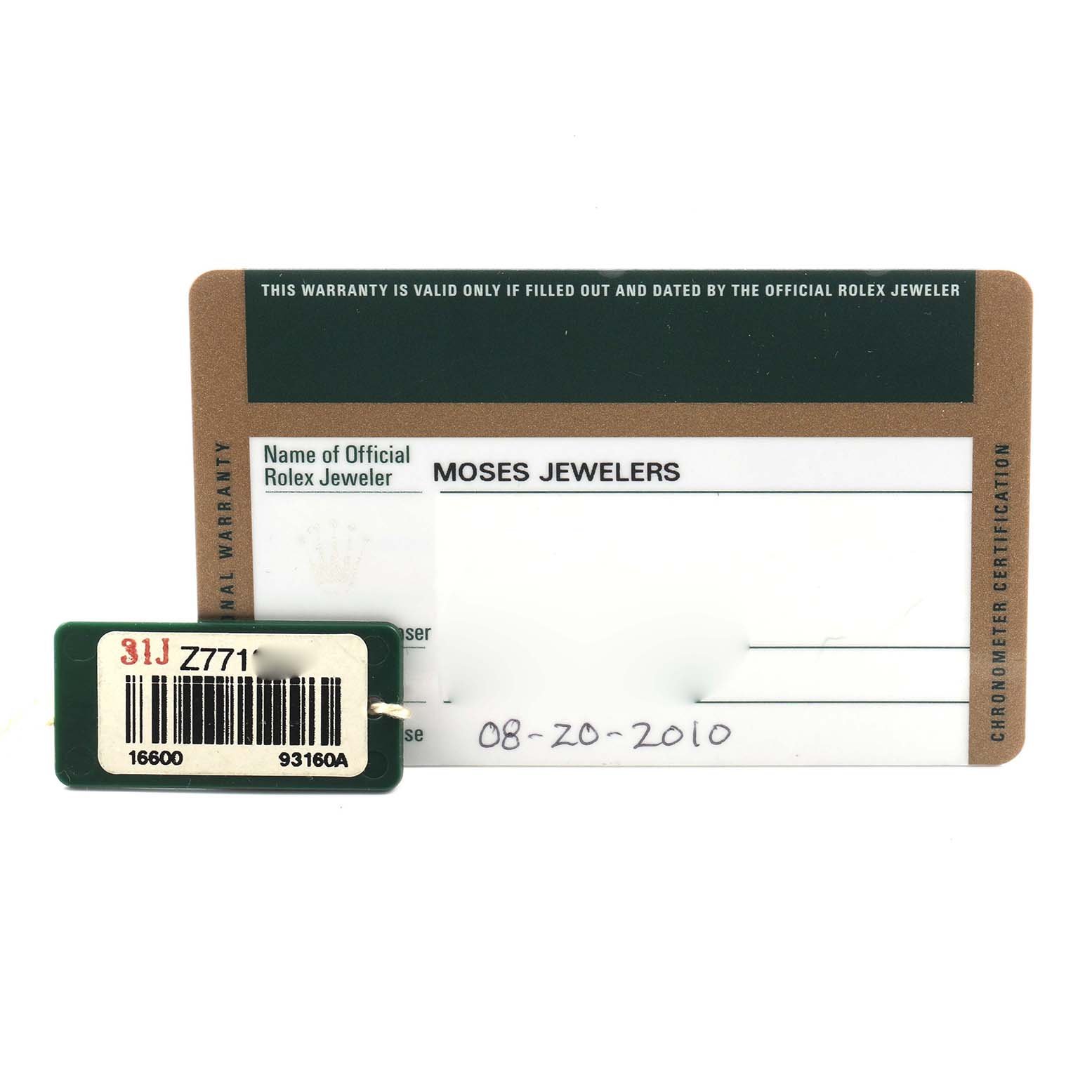 The image shows a warranty card and a tag for a Rolex Sea-Dweller 16600 Men's Stainless Steel Black Dial 16600 Men's Stainless Steel Black Dial watch, viewed from above.