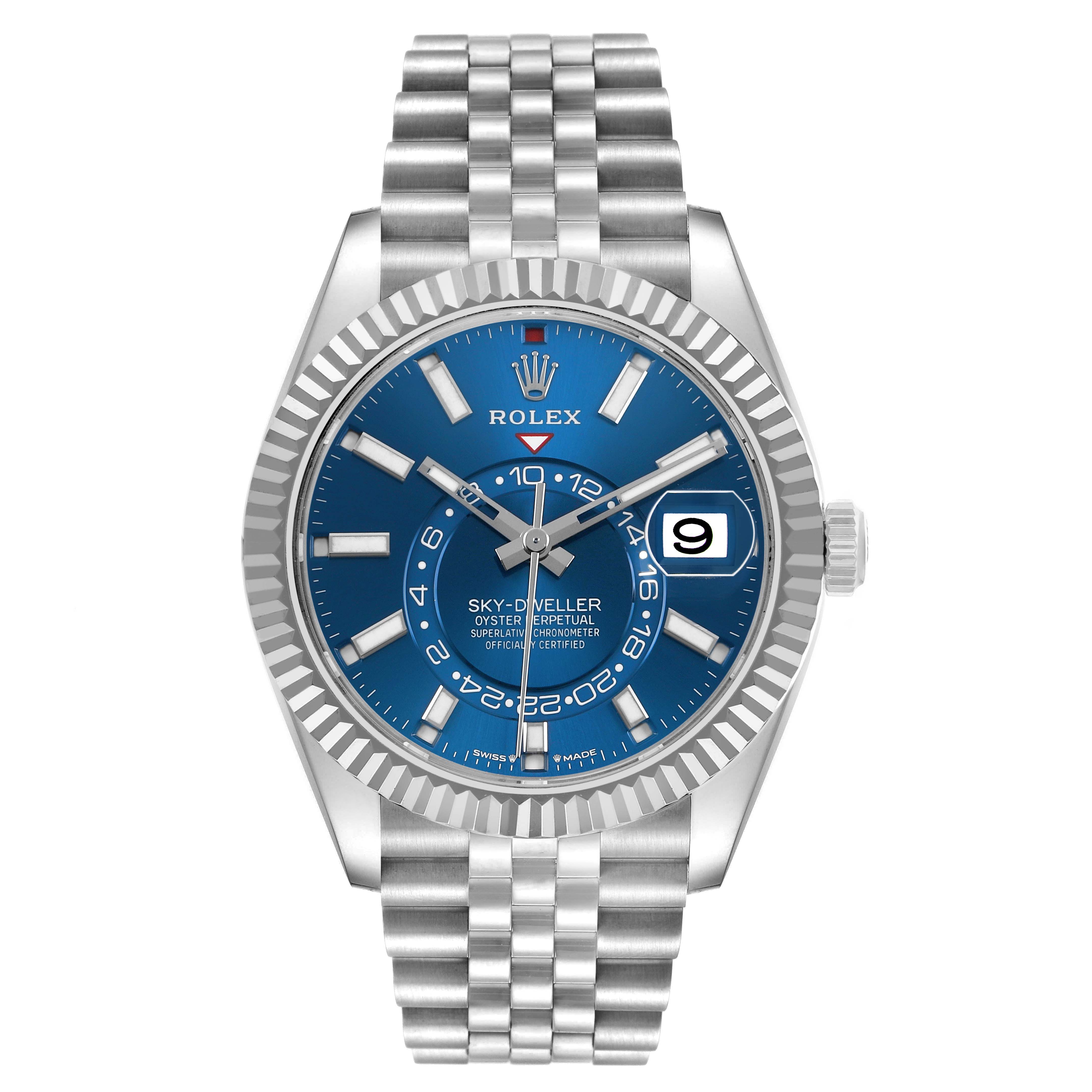 The Rolex Sky-Dweller 336934 Men's Stainless Steel Blue Dial watch is shown from a front angle, displaying its blue dial, fluted bezel, and bracelet.