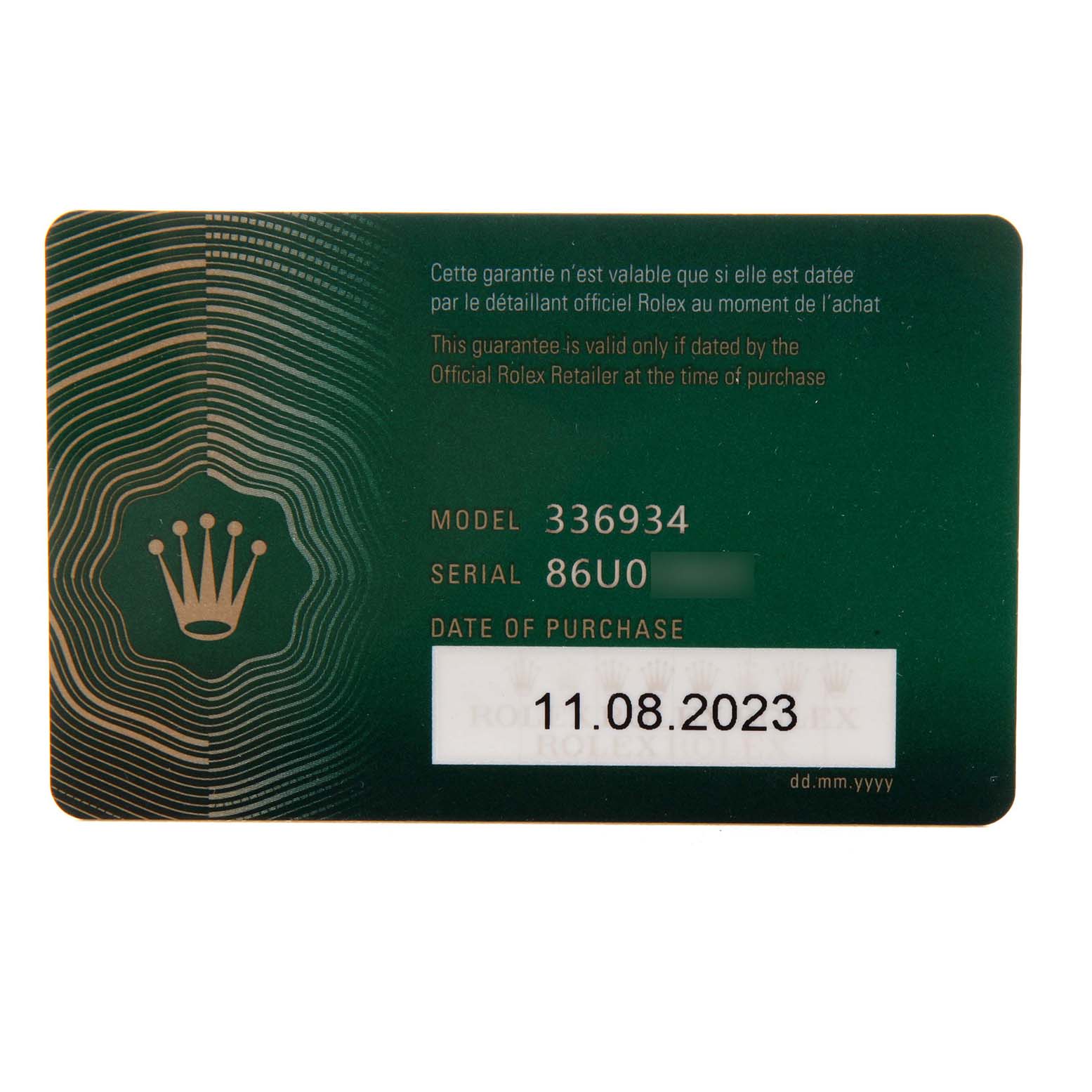 This image shows a warranty card for a Rolex Sky-Dweller 336934 Men's Stainless Steel Blue Dial model, displaying its serial and model numbers.