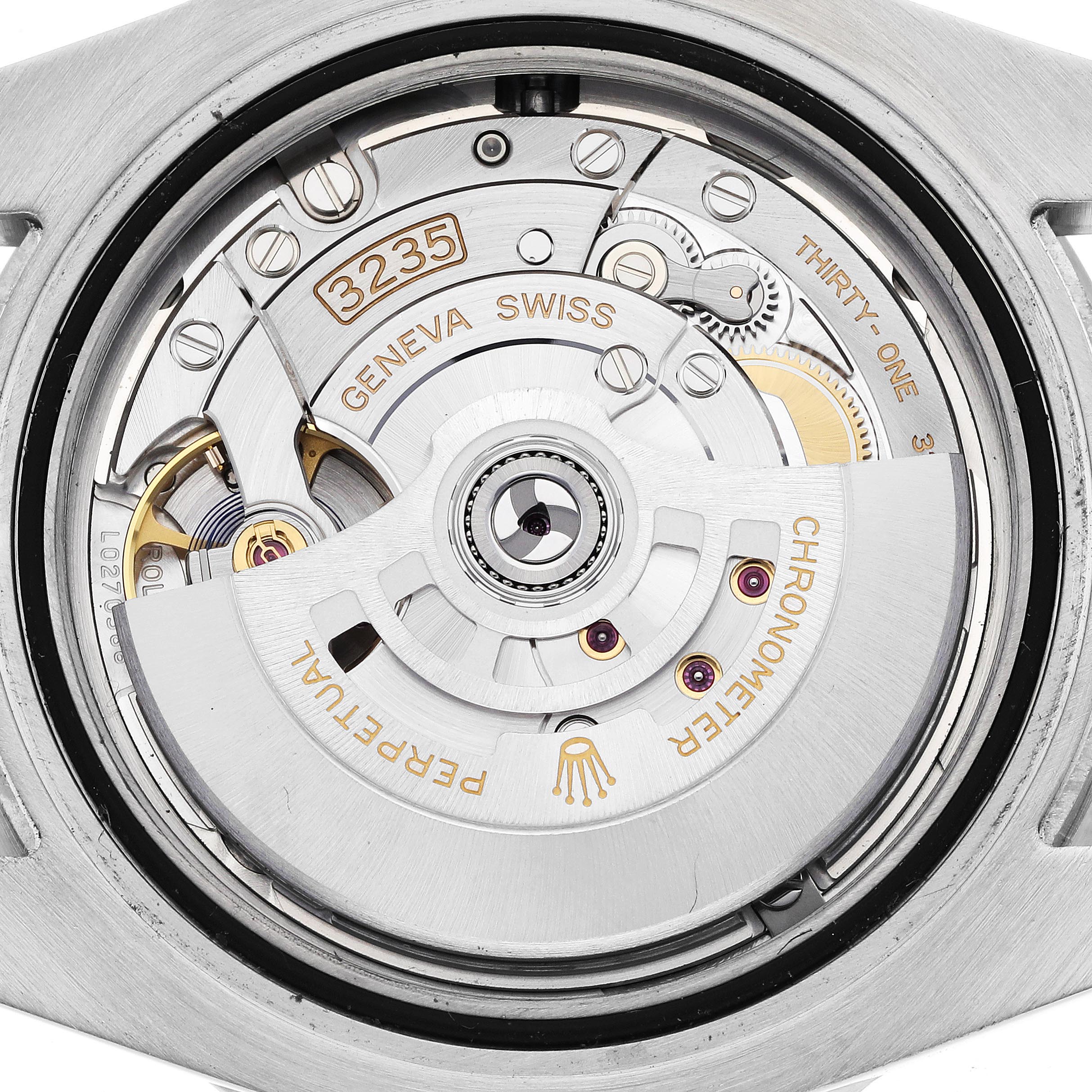 The image shows a close-up of the movement mechanism of the Rolex Submariner 126610LN Men's Stainless Steel Black Dial 126610LN Men's Stainless Steel Black Dial watch from a top-down angle.