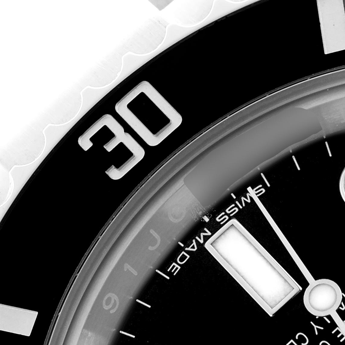 The image shows a close-up of the Rolex Submariner 116610 Men's Stainless Steel Black Dial 116610 Men's Stainless Steel Black Dial's bezel and dial, highlighting the "30" mark and "SWISS MADE" text.
