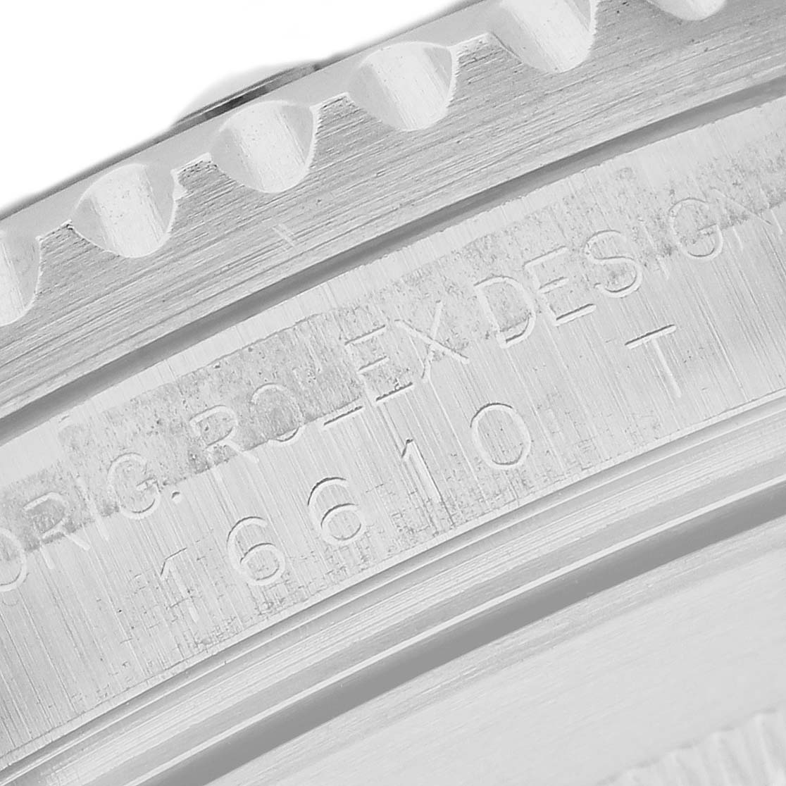 This image shows a close-up of the bezel and case of a Rolex Submariner 16610 Men
s Stainless Steel Black Dial 16610 Men
s Stainless Steel Black Dial model, highlighting the engraved text and model number.