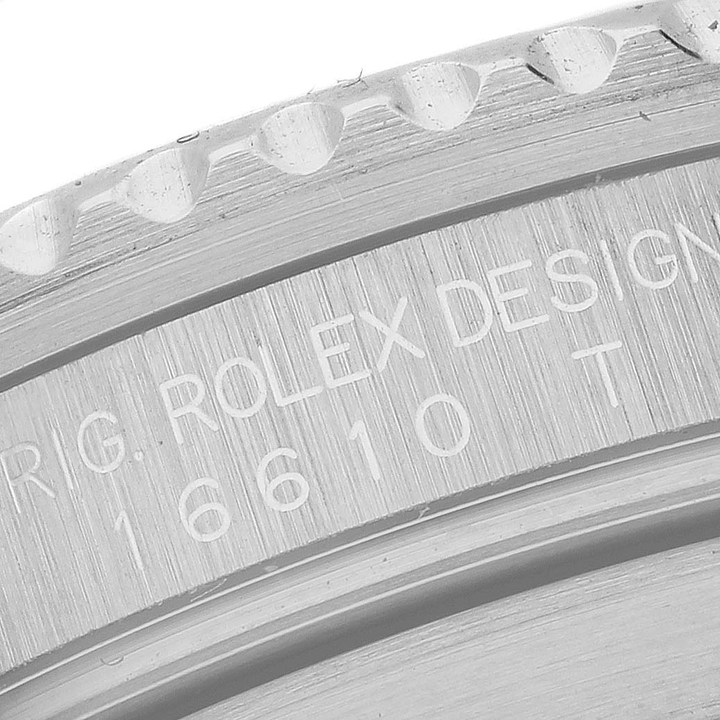 The image shows an angled close-up of the bezel and engraved text on the side of a Rolex Submariner 16610 Men
s Stainless Steel Black Dial 16610 Men
s Stainless Steel Black Dial watch.