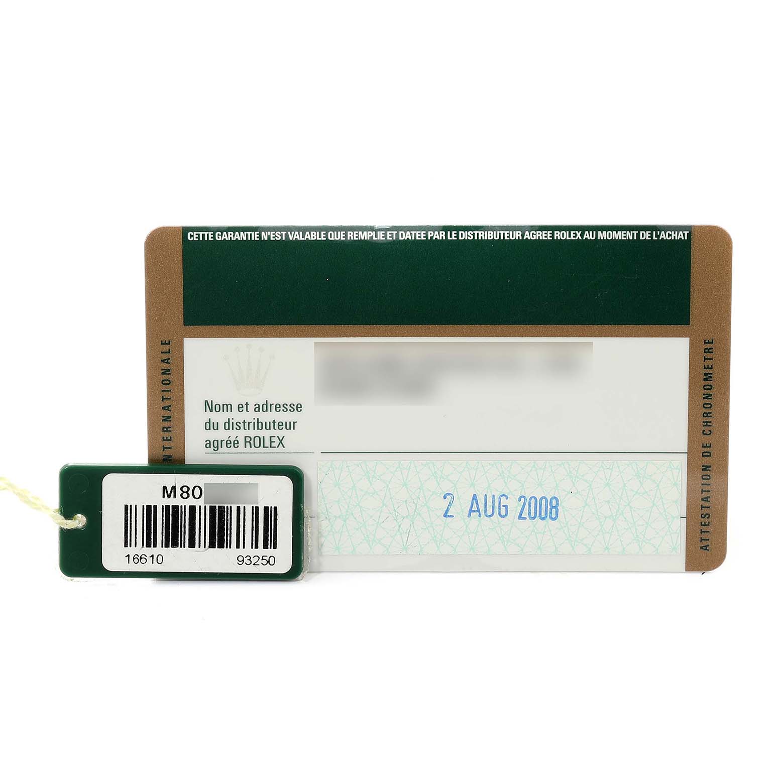 The image shows the warranty card and tag of a Rolex Submariner 16610 Men
s Stainless Steel Black Dial 16610 Men
s Stainless Steel Black Dial with a date of purchase of 2 Aug 2008.