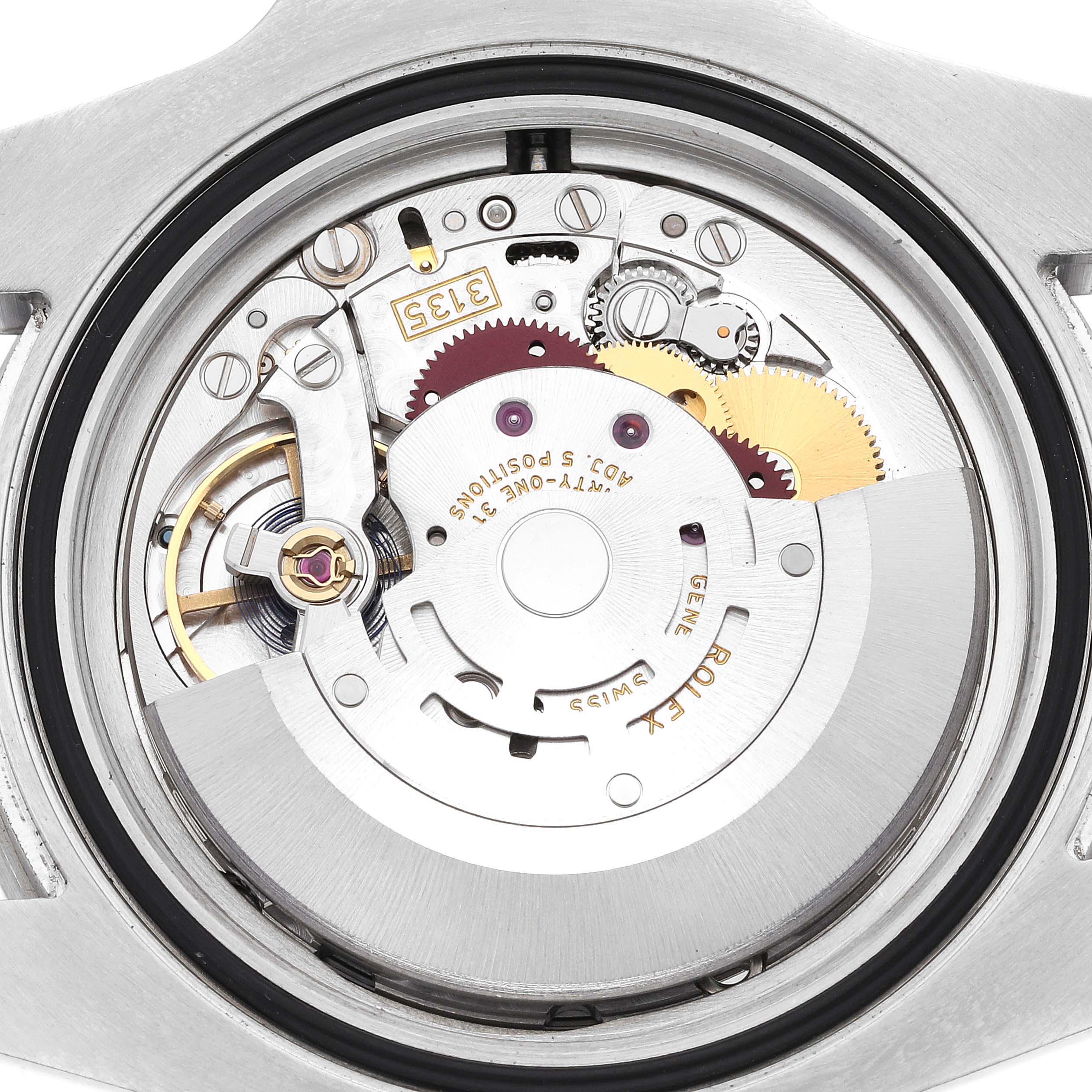 This image shows the intricate inner mechanism of a Rolex Submariner 116610LV Men's Stainless Steel Green Dial 116610LV Men's Stainless Steel Green Dial watch from a back view with its gears and moving parts exposed.