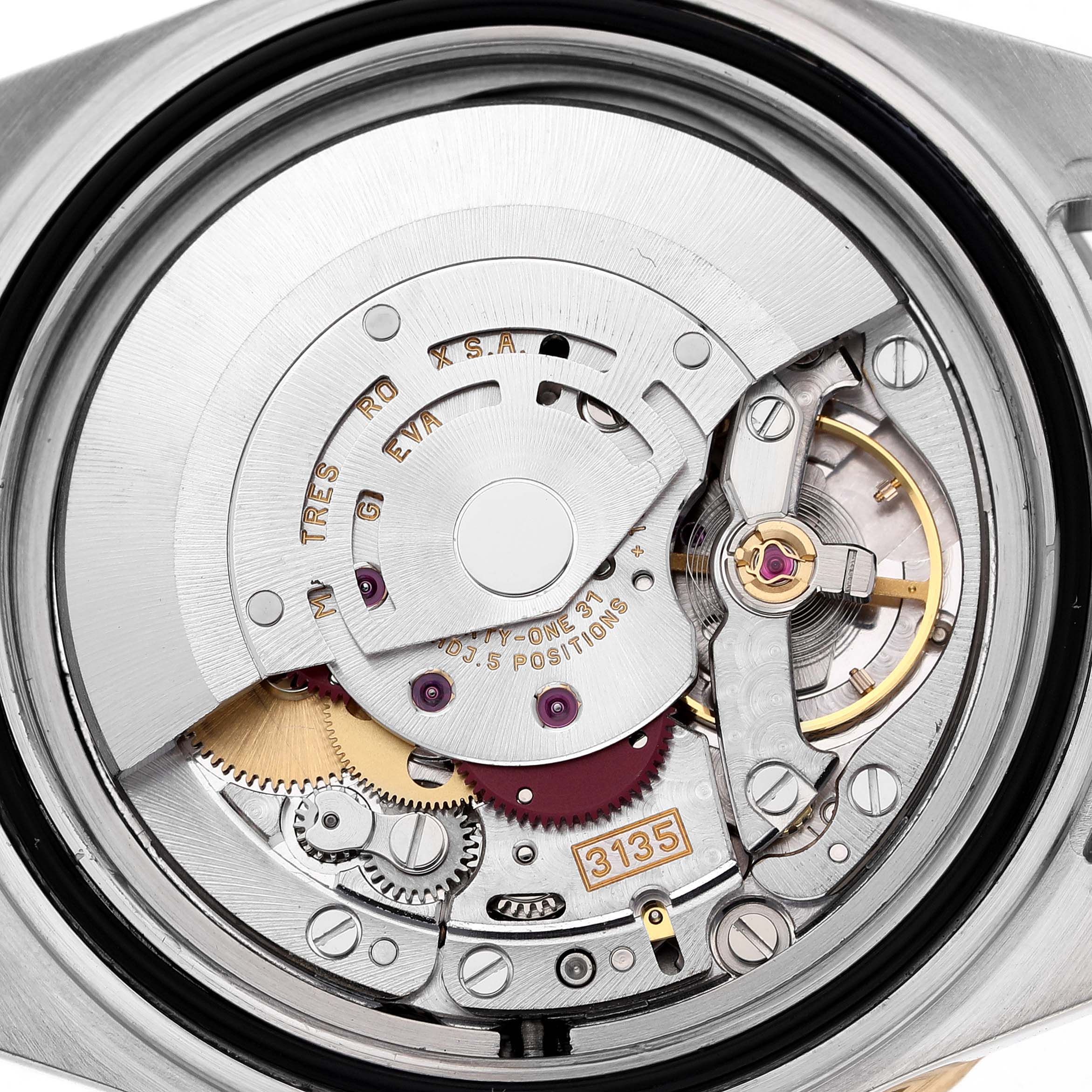 The image shows a detailed view of the Rolex Submariner 16613 Men's Steel and Gold (two tone) Black Dial's movement, highlighting its intricate internal mechanical components.