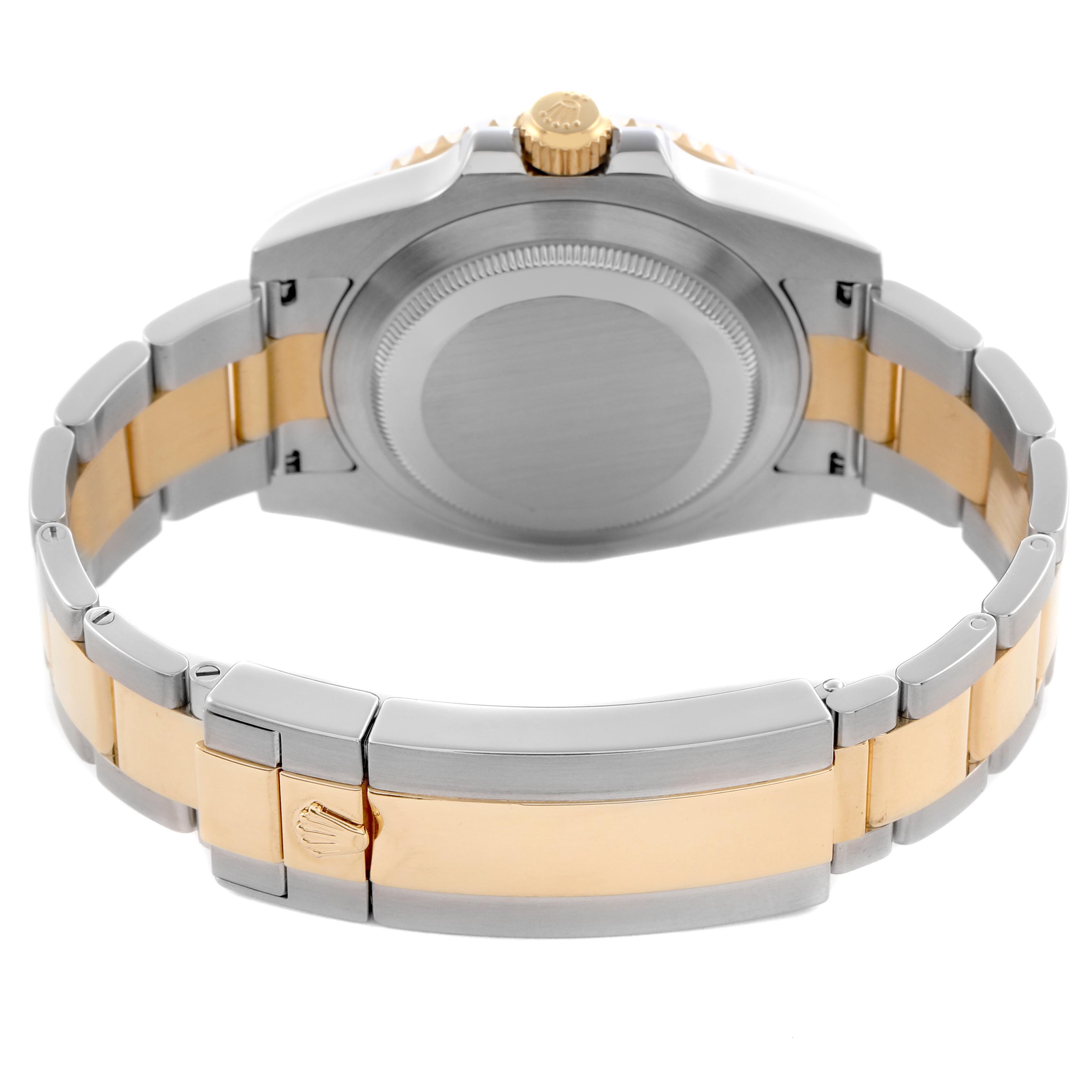 The image shows the back and bracelet of a Rolex Submariner 116613LB Men's Steel and Gold (two tone) Blue Dial 116613LB Men's Steel and Gold (two tone) Blue Dial, highlighting the two-tone metal and the clasp.