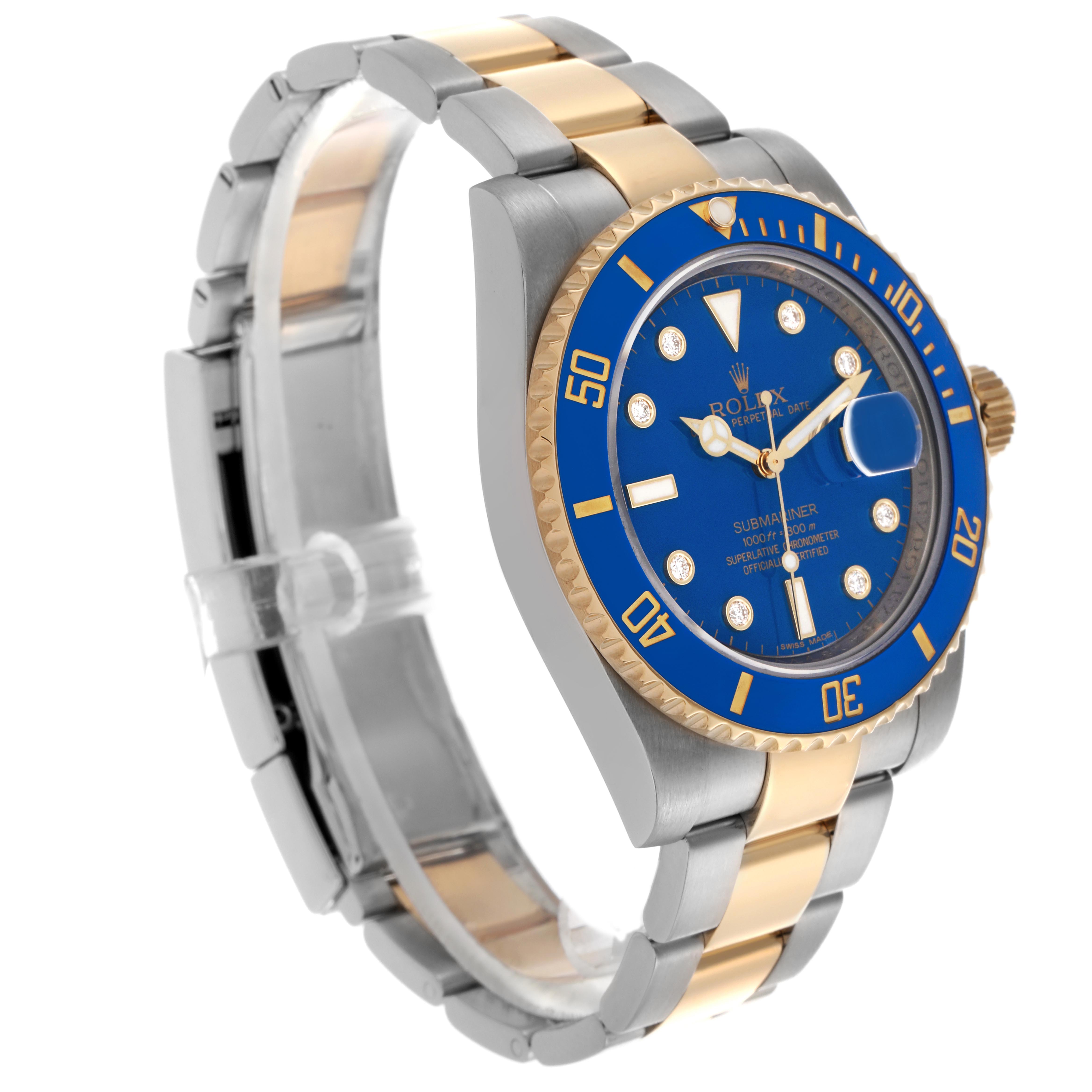 The Rolex Submariner 116613LB Men's Steel and Gold (two tone) Blue Dial 116613LB Men's Steel and Gold (two tone) Blue Dial watch is shown at a three-quarter angle, displaying the blue dial, bezel, and two-tone bracelet.