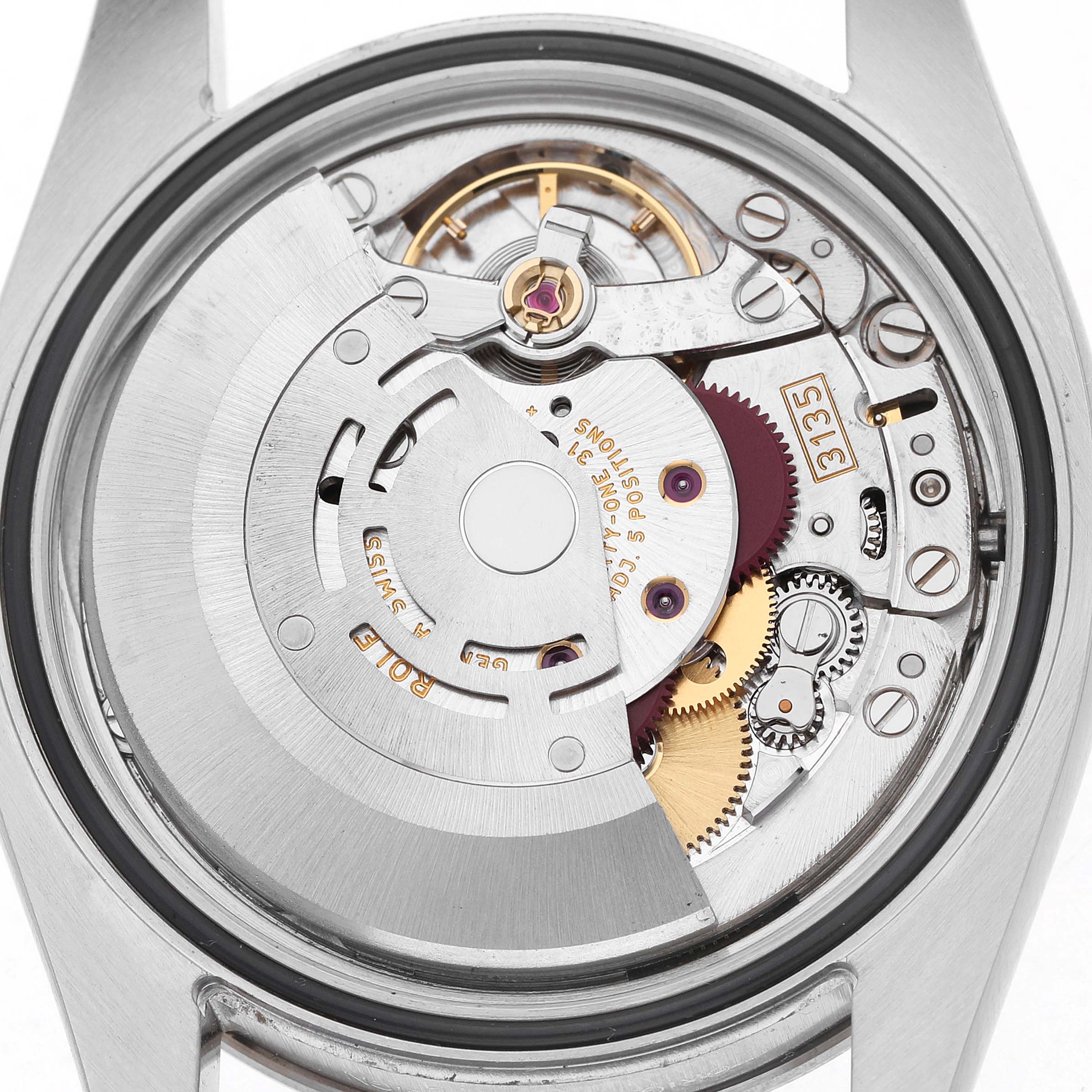 The image shows the back view of a Rolex Turn-o-Graph 116264 Men's Stainless Steel White Dial watch, highlighting the movement and rotor inside the case.