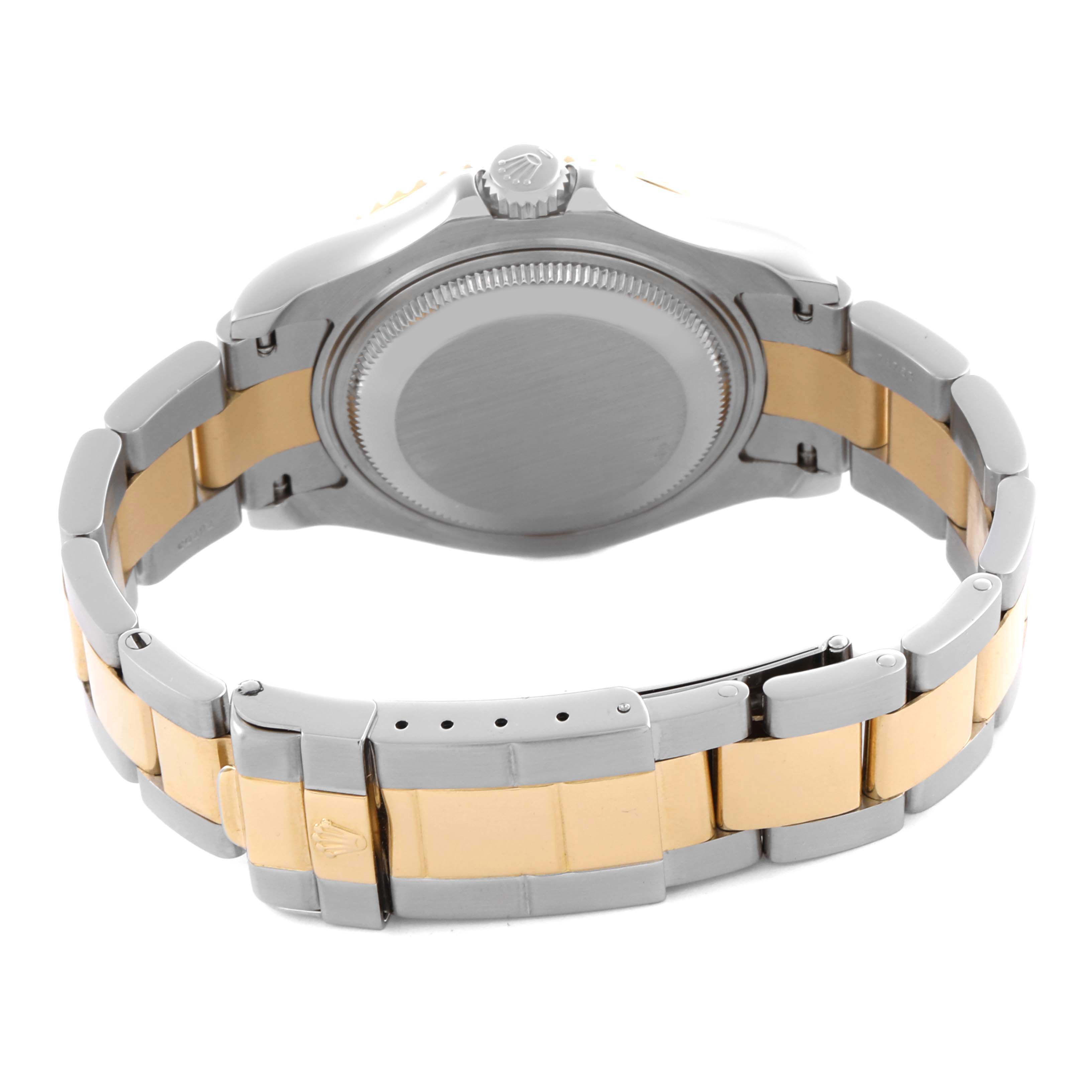 The Rolex Yacht-Master 168623 Men
s Steel and Gold (two tone) White Dial 168623 Men
s Steel and Gold (two tone) White Dial watch is shown from the back and side, highlighting the case, crown, and two-tone bracelet.