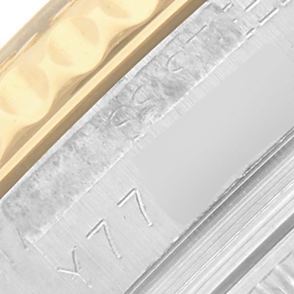 The image shows a close-up of the Rolex Yacht-Master 168623 Men
s Steel and Gold (two tone) White Dial 168623 Men
s Steel and Gold (two tone) White Dial
s case side with visible engraved details.