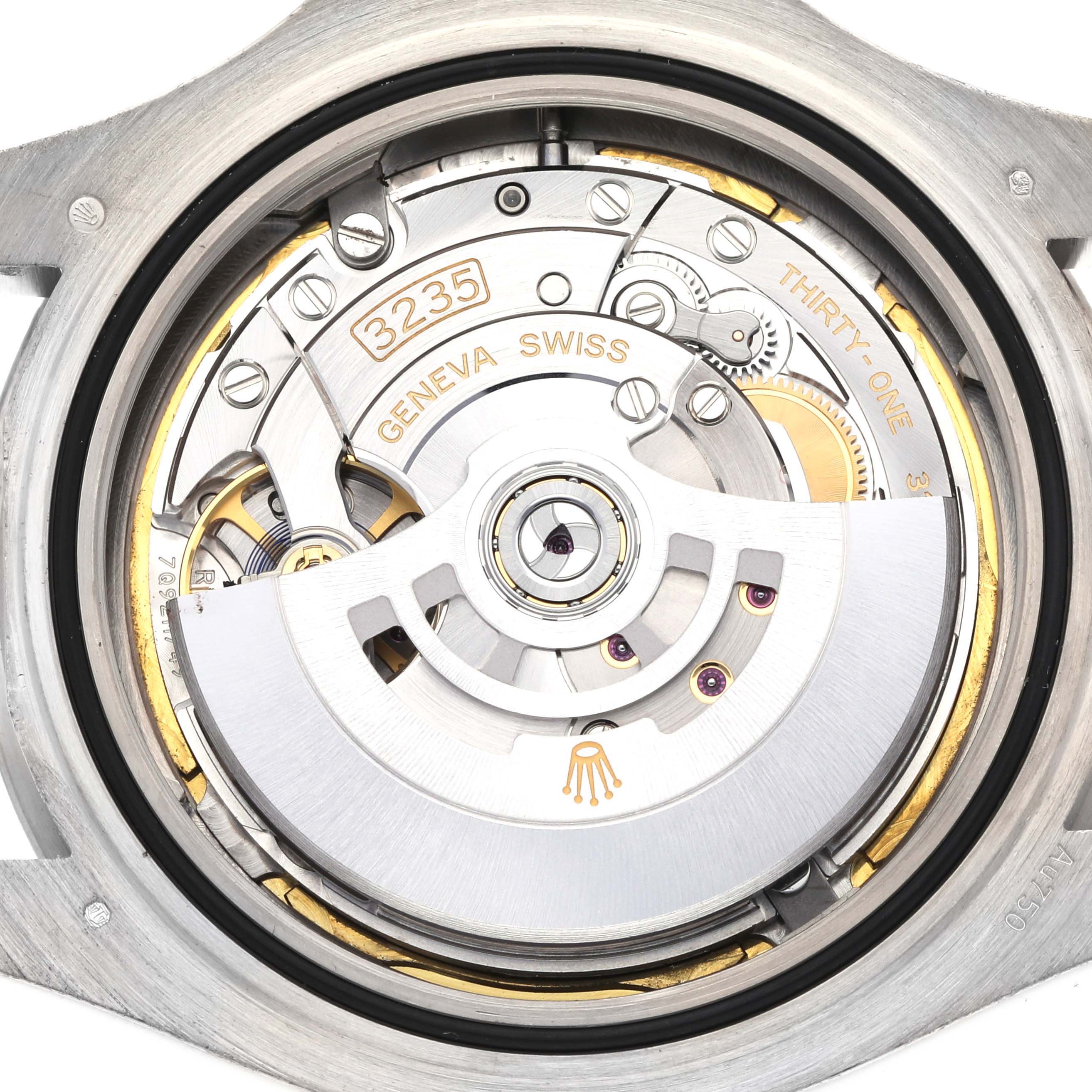 The image shows the Rolex Yacht-Master 226659 Men's White Gold Black Dial 226659 Men's White Gold Black Dial watch movement from the back, highlighting the rotor and intricate inner components.