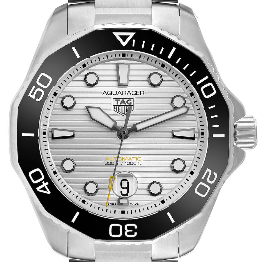 The Tag Heuer Aquaracer watch is shown from a front angle, displaying the bezel, dial, hands, and crown.