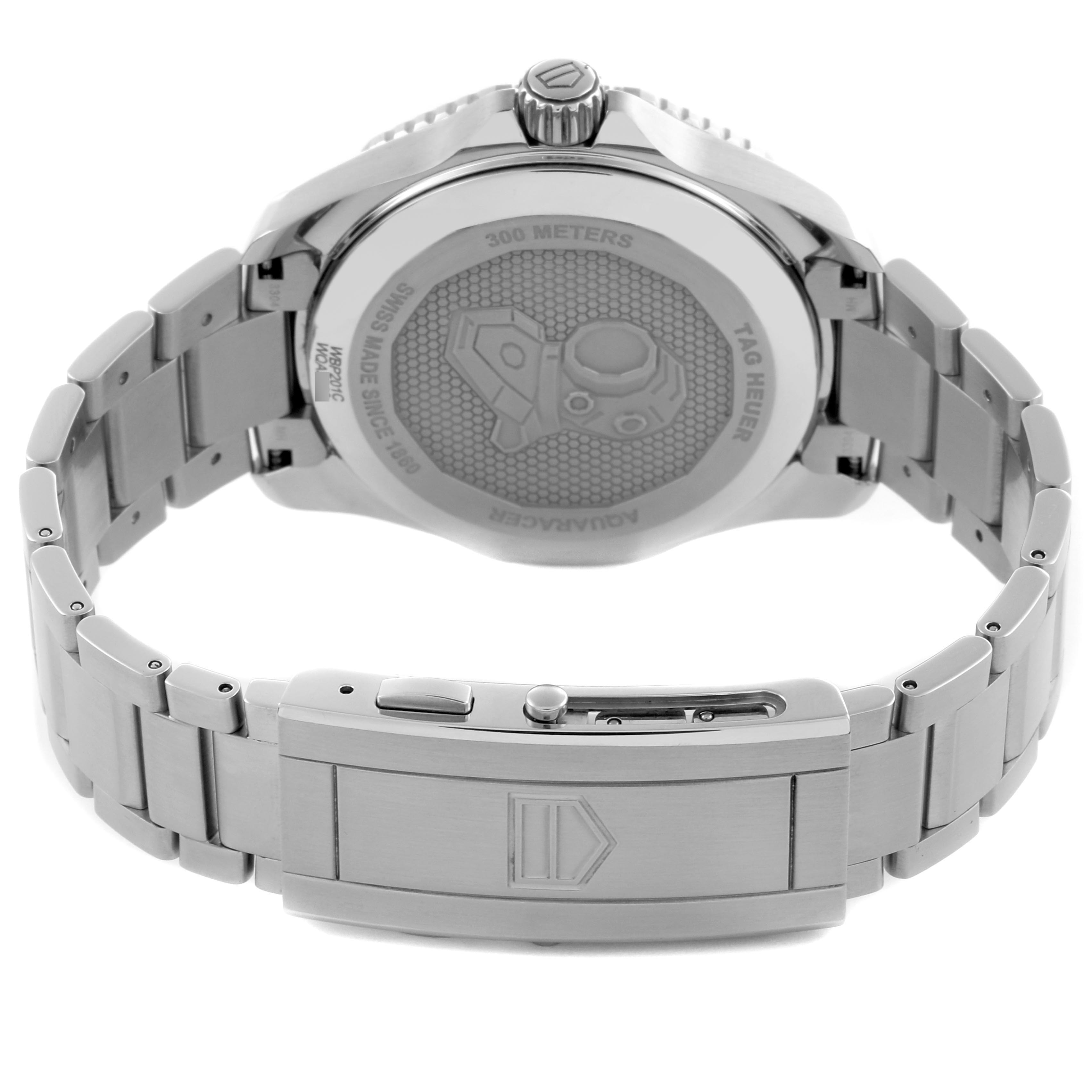 The image shows the back and clasp of a Tag Heuer Aquaracer WBP201C.BA0632 Men's Stainless Steel Silver Dial WBP201C.BA0632 Men's Stainless Steel Silver Dial watch, displaying its bracelet and engraved case back.