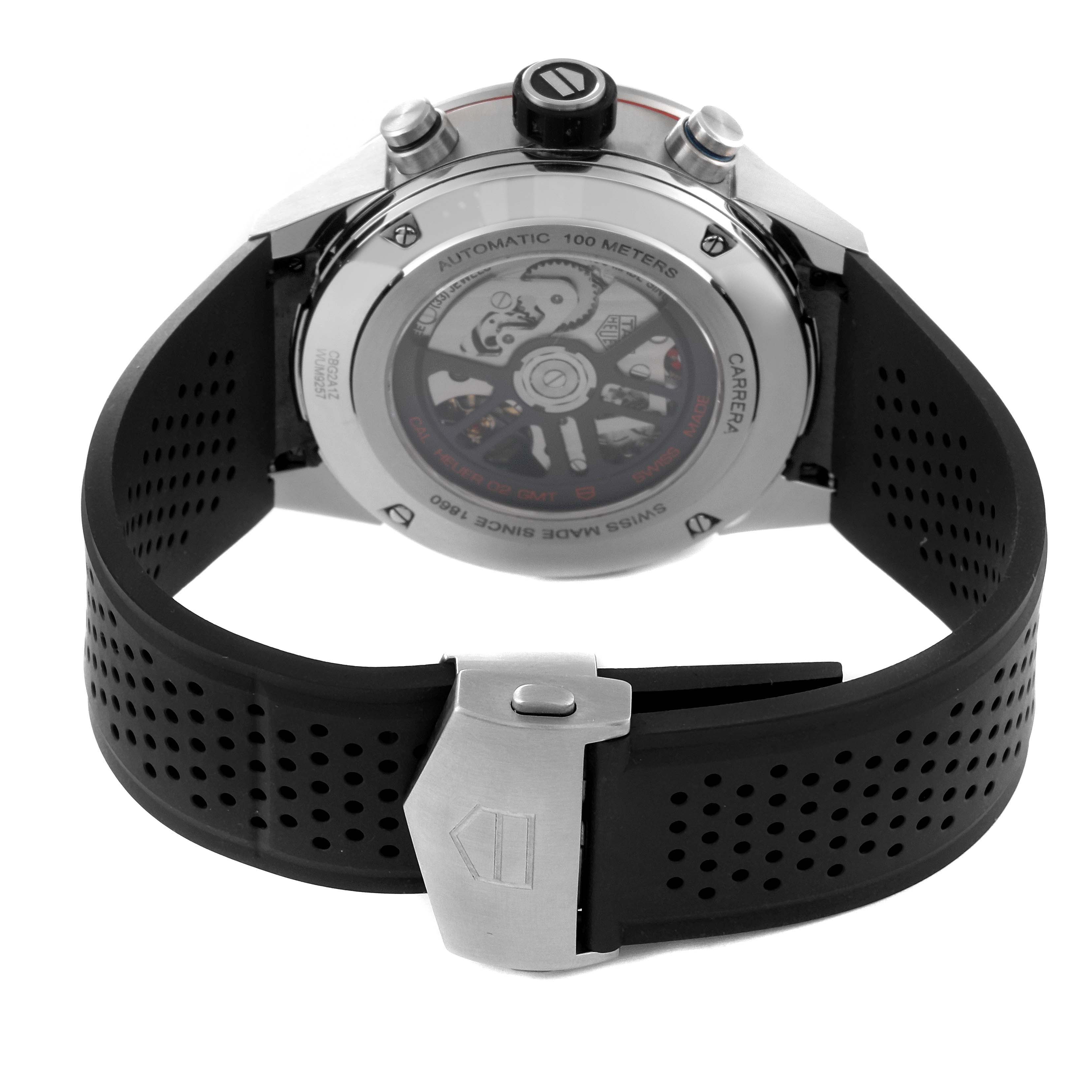 The image shows the back view of the Tag Heuer Carrera CBG2A1Z.BA0658 Men's Stainless Steel Black Dial CBG2A1Z.BA0658 Men's Stainless Steel Black Dial model watch, highlighting the transparent case back and black perforated strap.