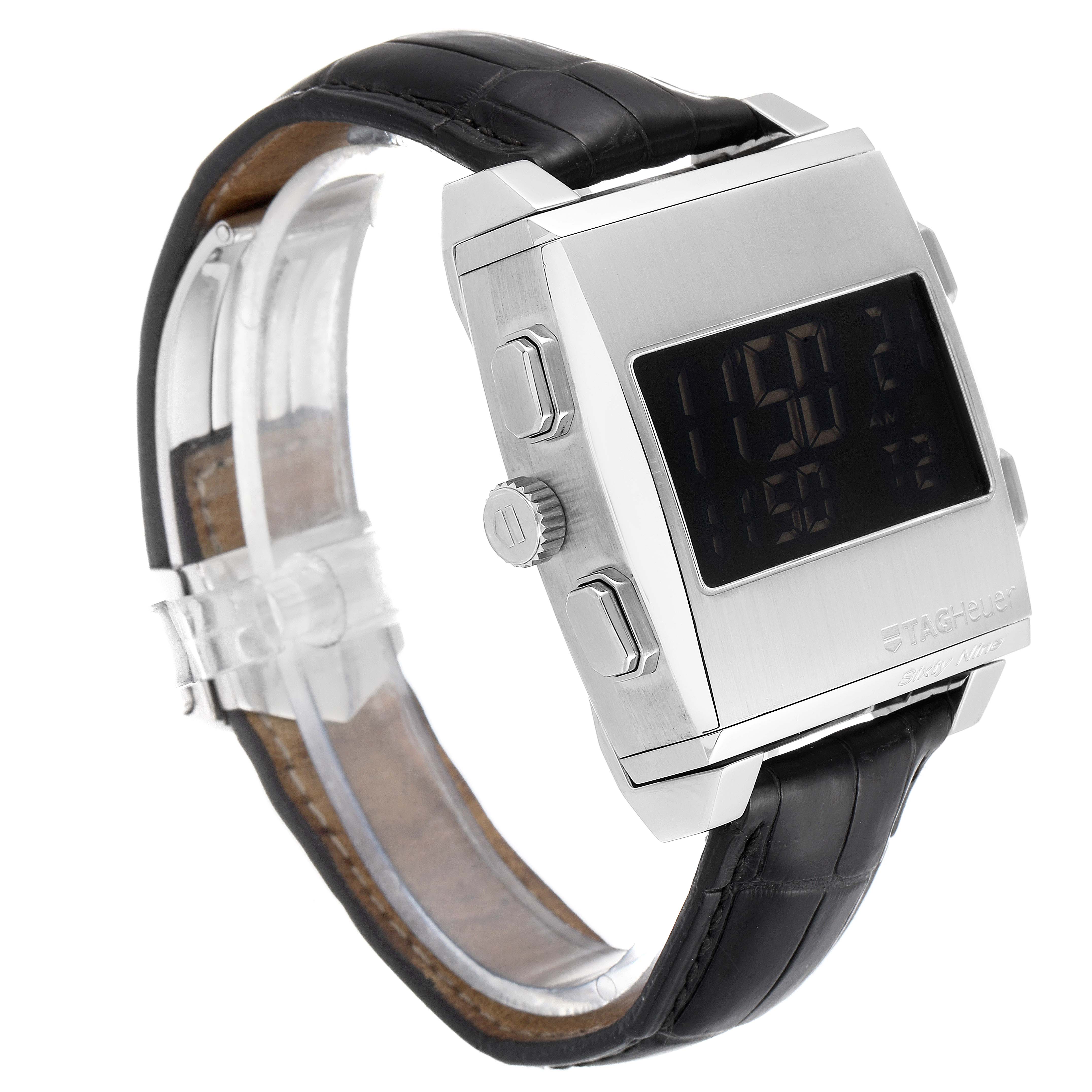 The image shows a side view of a Tag Heuer Monaco CW9110.FC6177 Men's Stainless Steel Black Dial CW9110.FC6177 Men's Stainless Steel Black Dial watch, displaying the buttons, crown, and black leather strap.