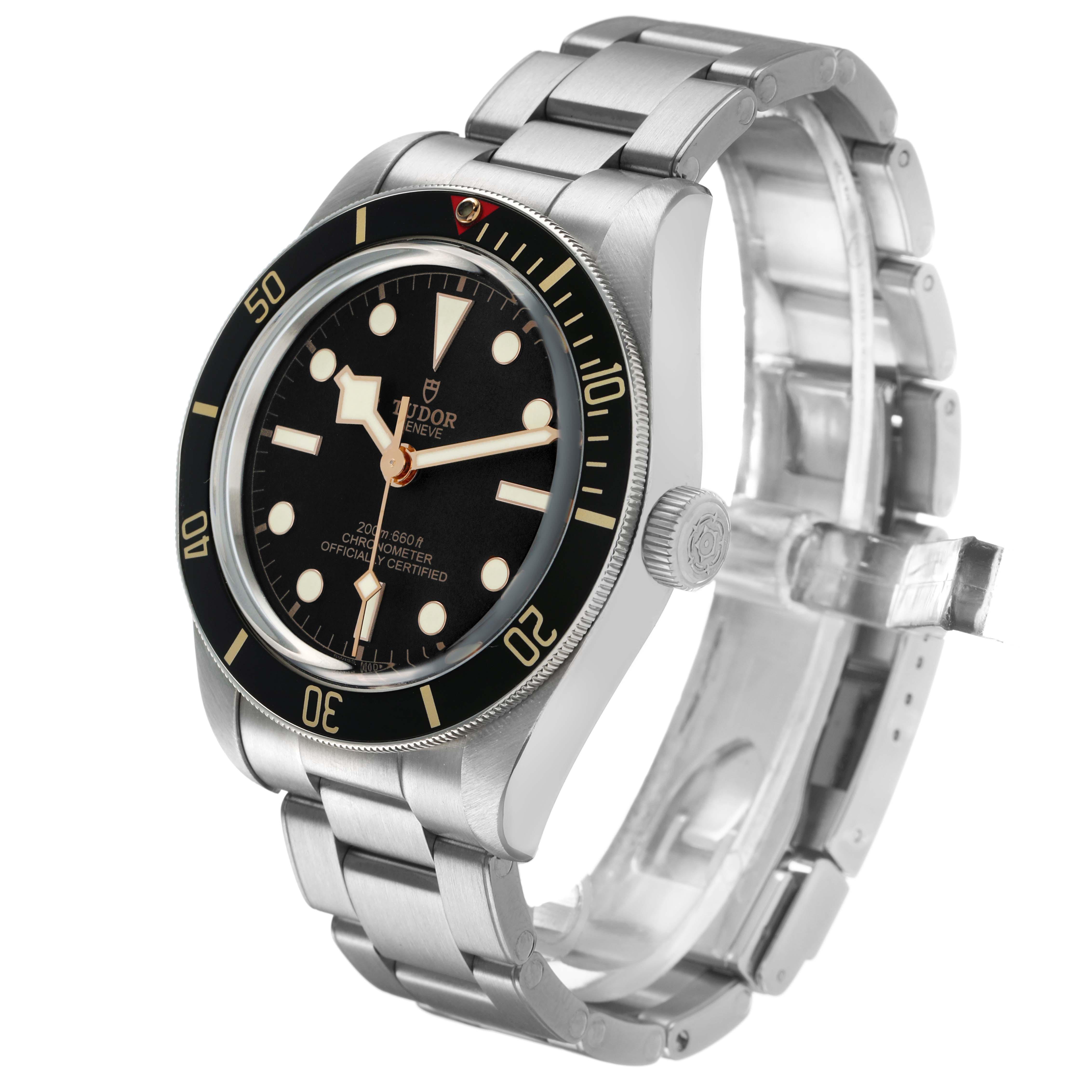 The Tudor Heritage Black Bay M79030N-0001 Men's Stainless Steel Black Dial watch is shown at a three-quarter angle, highlighting the face, bezel, crown, and bracelet.