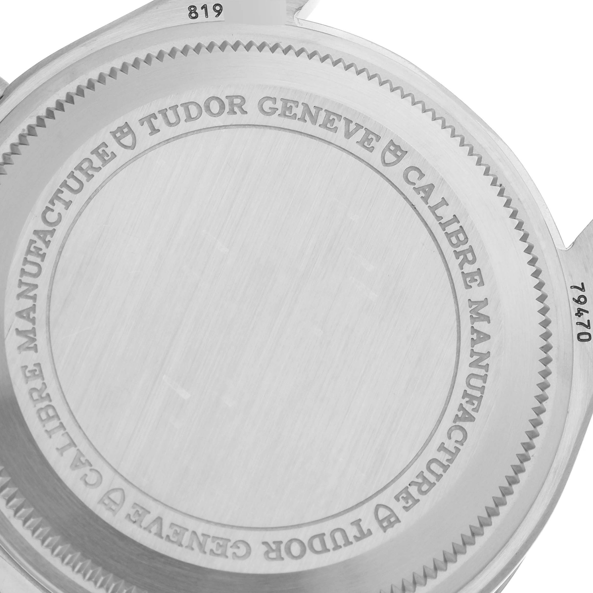 This image shows the case back of a Tudor Heritage Black Bay M79470-0001 Men
s Stainless Steel Black Dial M79470-0001 Men
s Stainless Steel Black Dial watch, detailed with engravings of the brand and model specifications.