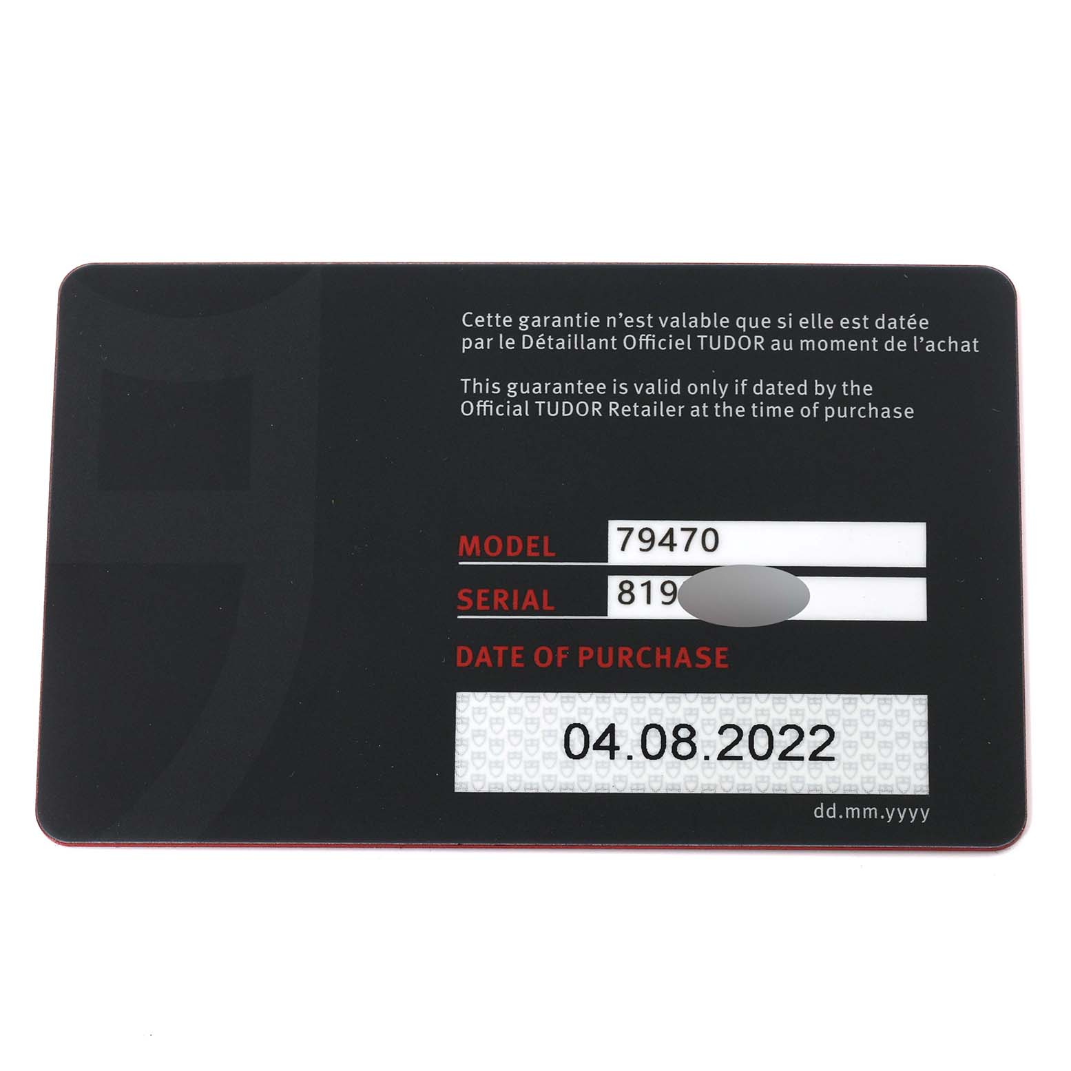 The image shows the warranty card for the Tudor Heritage Black Bay M79470-0001 Men
s Stainless Steel Black Dial M79470-0001 Men
s Stainless Steel Black Dial model, featuring the model number and date of purchase.