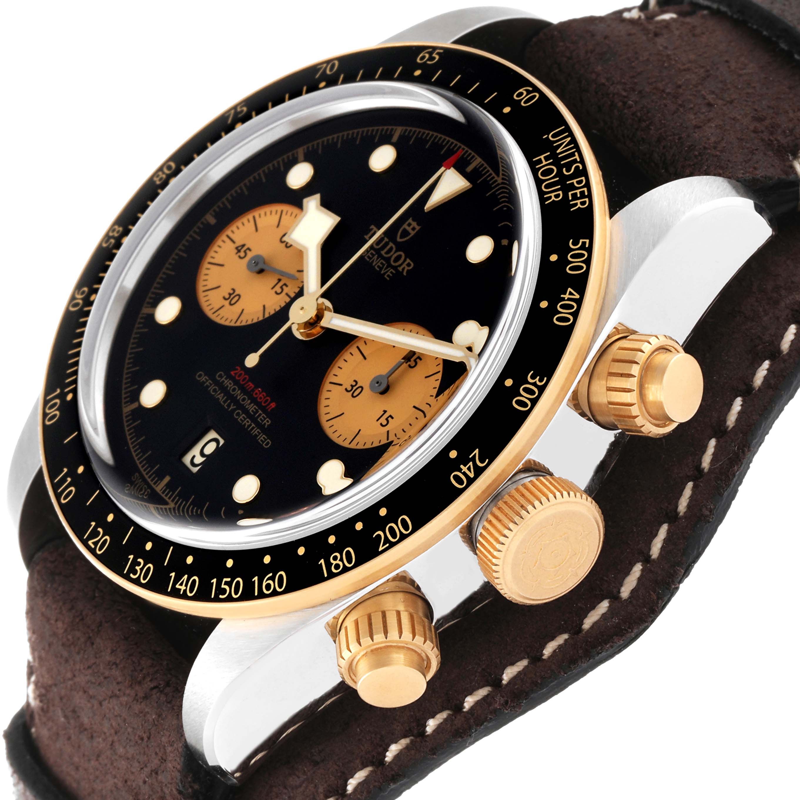 The image shows a Tudor Heritage Black Bay 79363N Men
s Steel and Gold (two tone) Black Dial 79363N Men
s Steel and Gold (two tone) Black Dial watch at an angle highlighting its face, bezel, pushers, and leather strap.