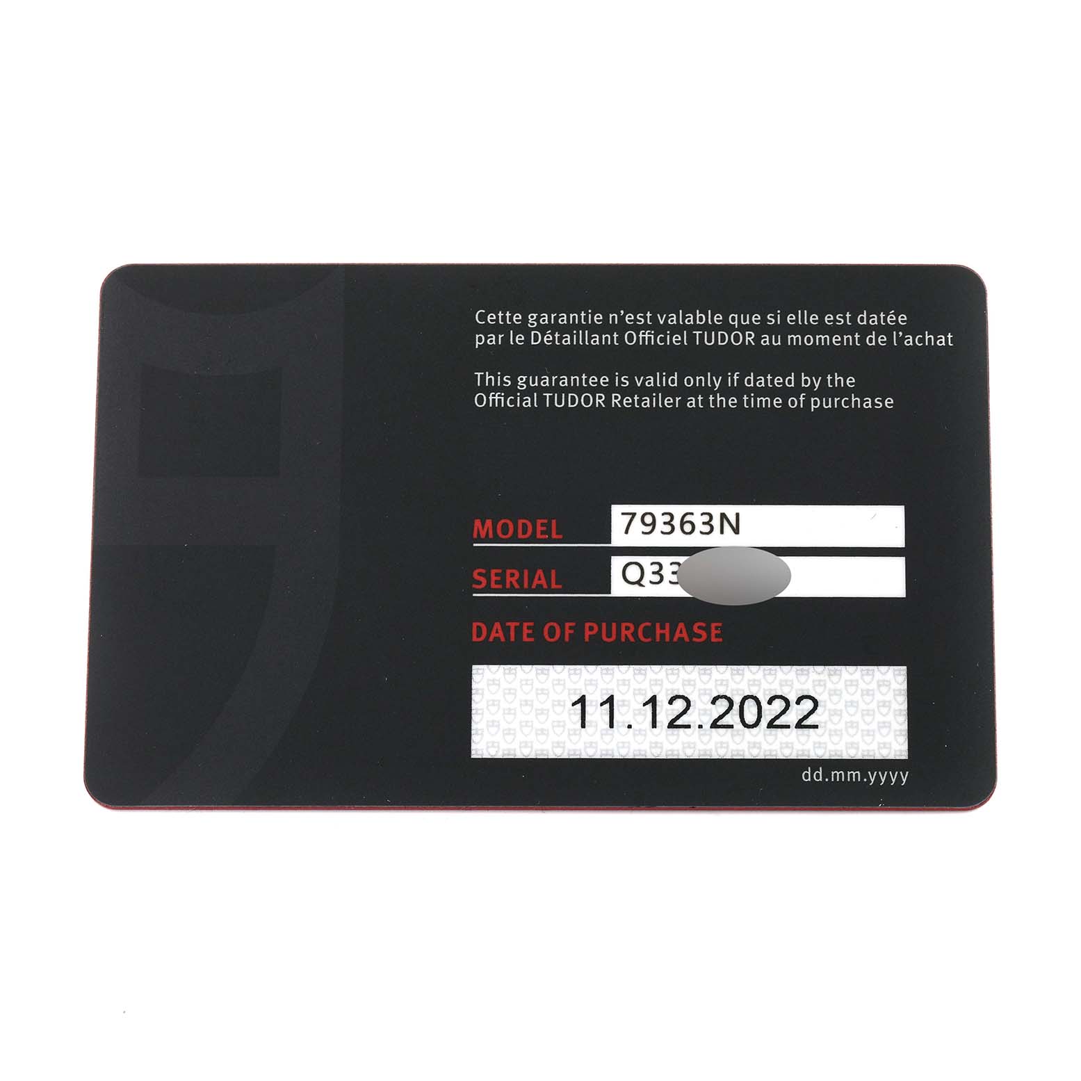 This is a warranty card for the Tudor Heritage Black Bay 79363N Men
s Steel and Gold (two tone) Black Dial 79363N Men
s Steel and Gold (two tone) Black Dial model with serial number details and the date of purchase.