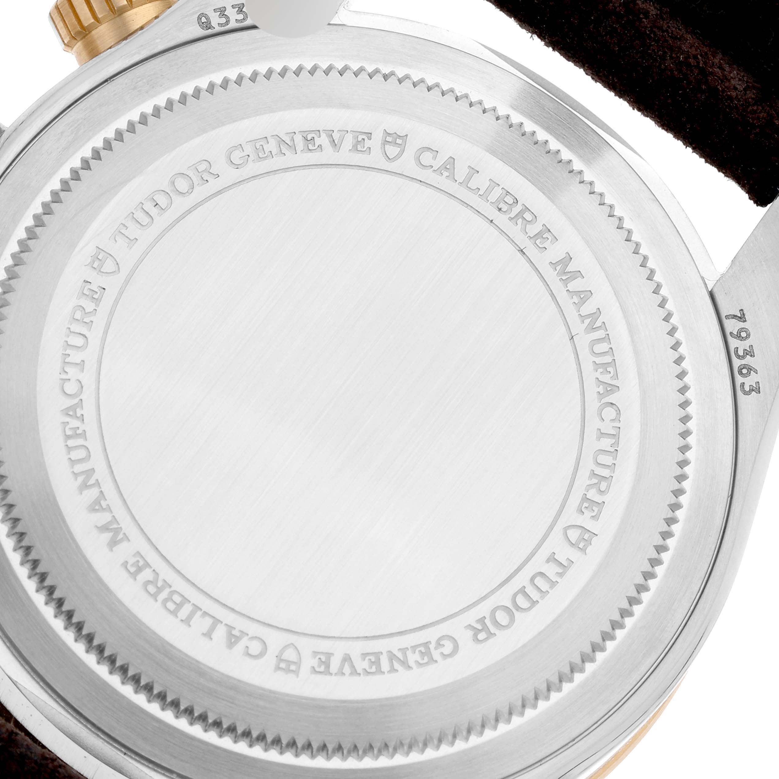 This image shows the case back of the Tudor Heritage Black Bay 79363N Men
s Steel and Gold (two tone) Black Dial 79363N Men
s Steel and Gold (two tone) Black Dial watch, displaying engraved details and the case number.