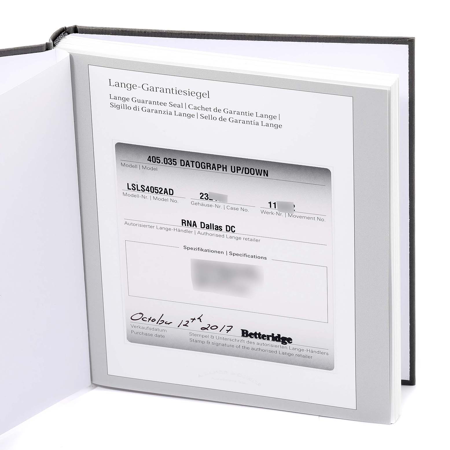 This image shows the warranty card and documentation for the A. Lange 
Sohne Datograph watch.