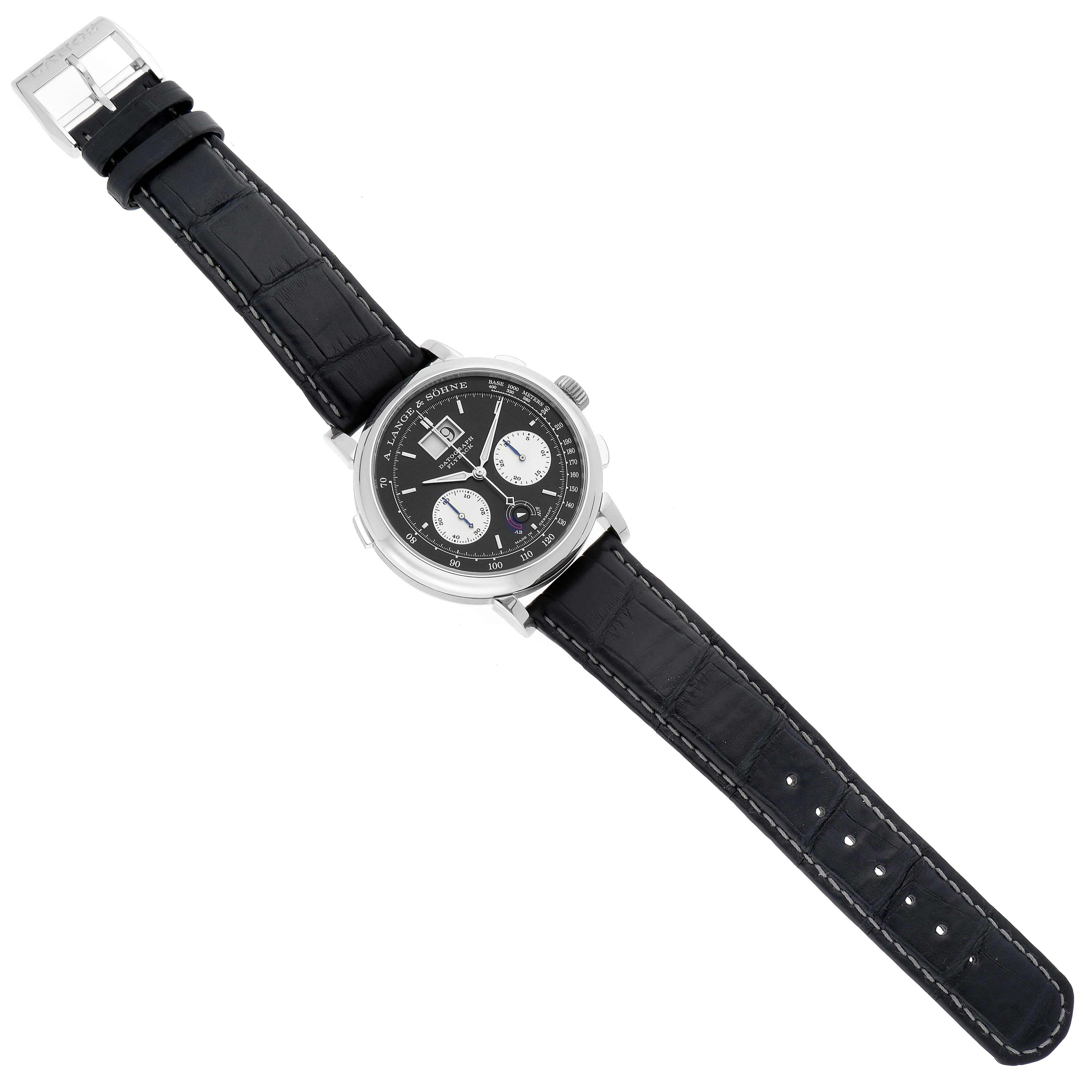 This A. Lange 
Sohne Datograph watch is shown from a top-down angle, showcasing the full face and black leather strap.