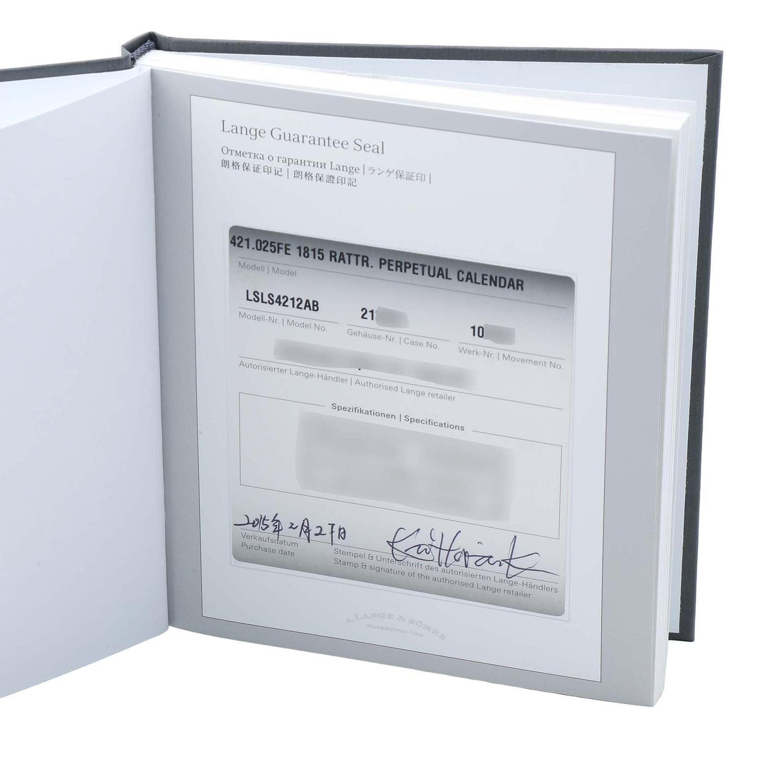 The image shows the warranty certificate for an A. Lange & Sohne 1815 421.025FE Men's Platinum Silver Dial model, featuring details like model and serial numbers.