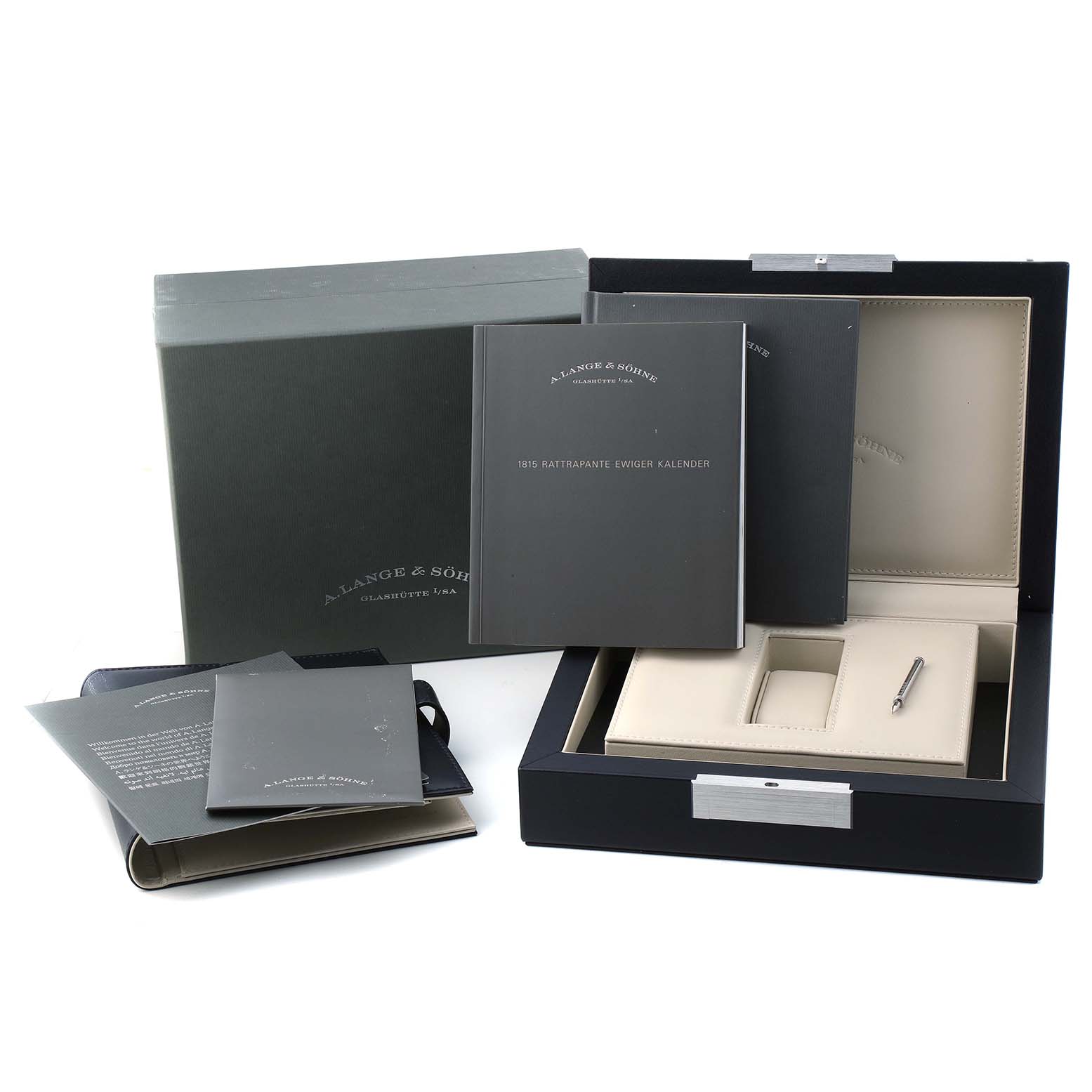 The image shows the box and documentation for the A. Lange & Sohne 1815 421.025FE Men's Platinum Silver Dial model, viewed from above.