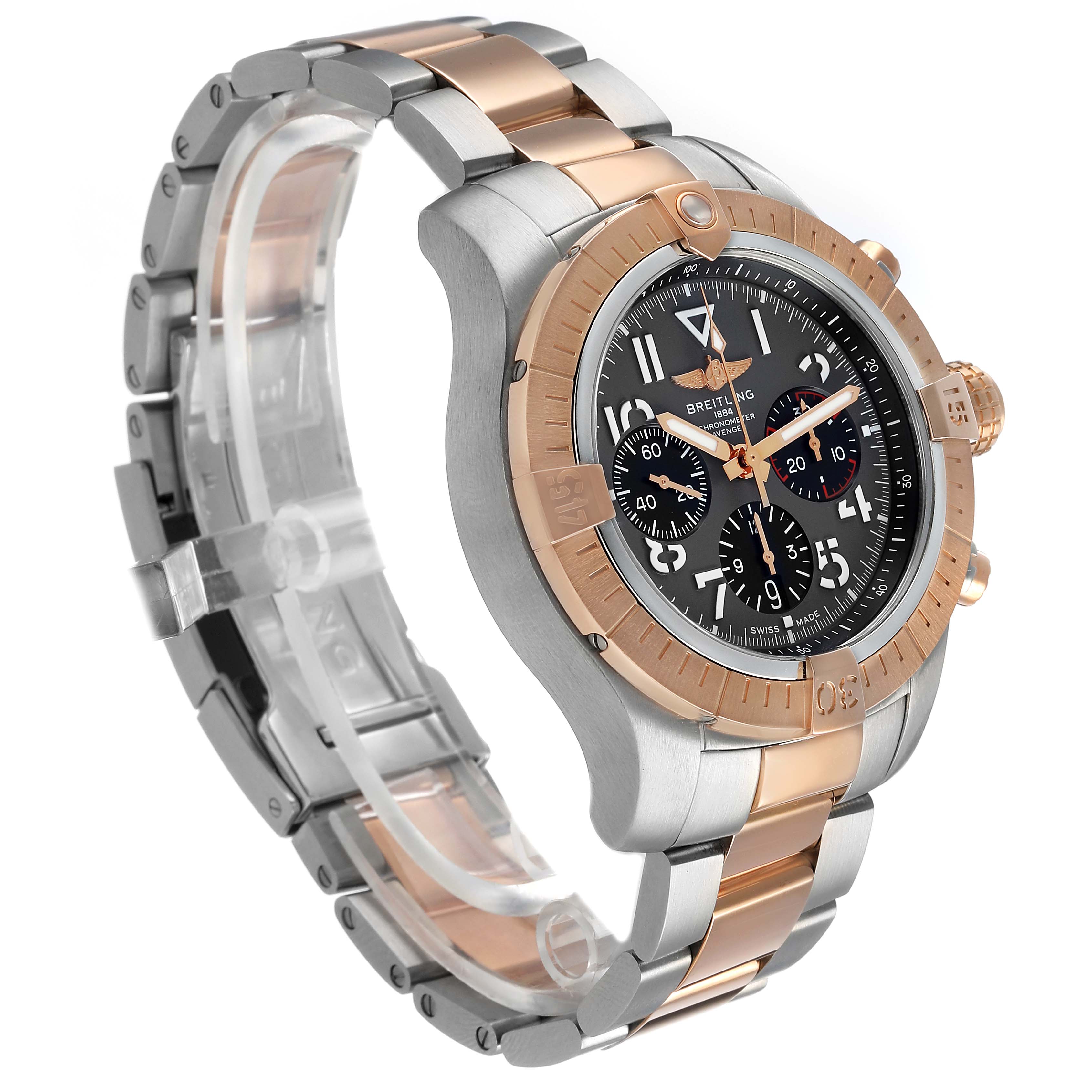 The Breitling Avenger UB01821A1B1U1 Men's Steel and Gold (two tone) Grey Dial watch is shown at a three-quarter angle, displaying the face, bezel, and bracelet clearly.