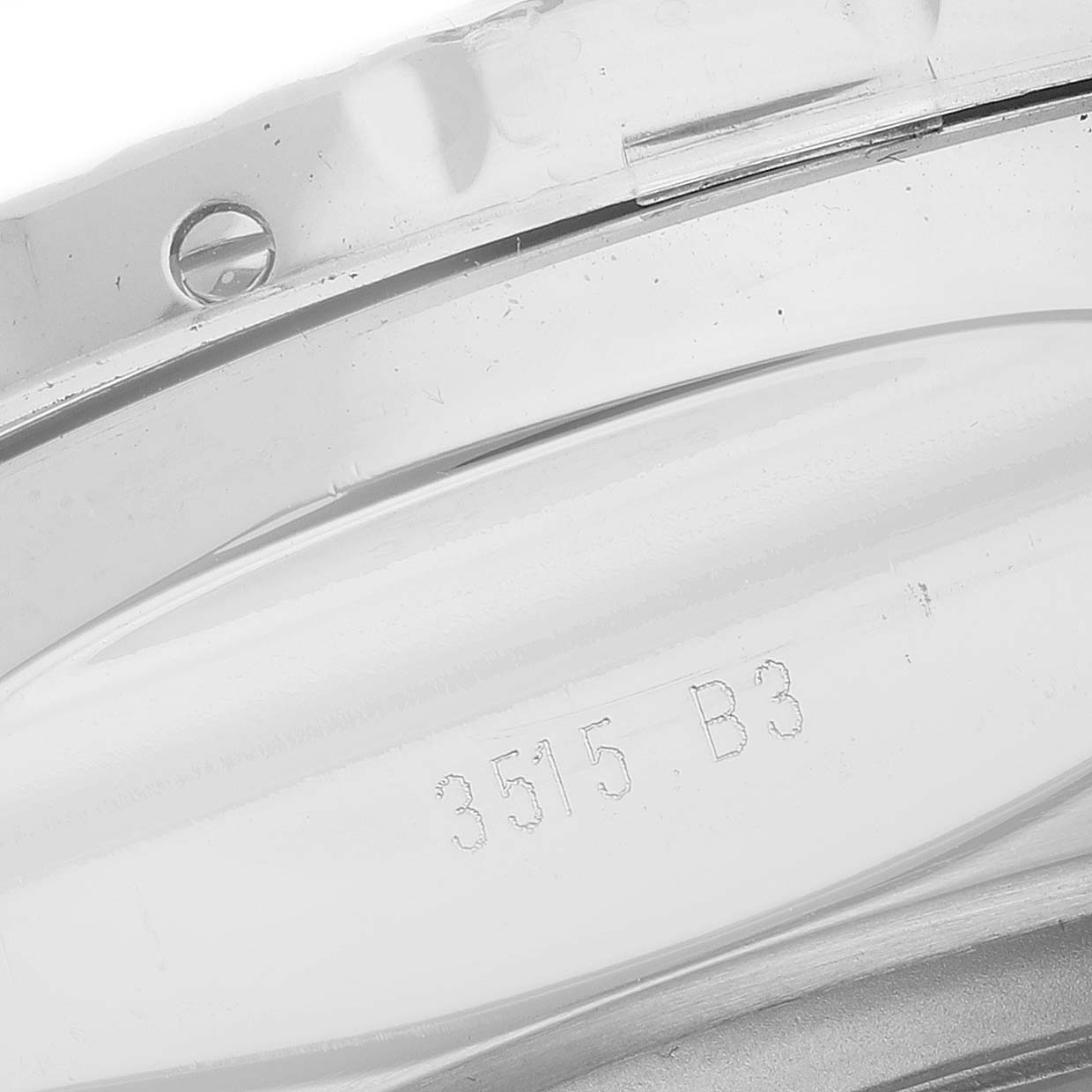 The image shows the side view of the Bentley model by Breitling, focusing on the watch band and engraved serial number.