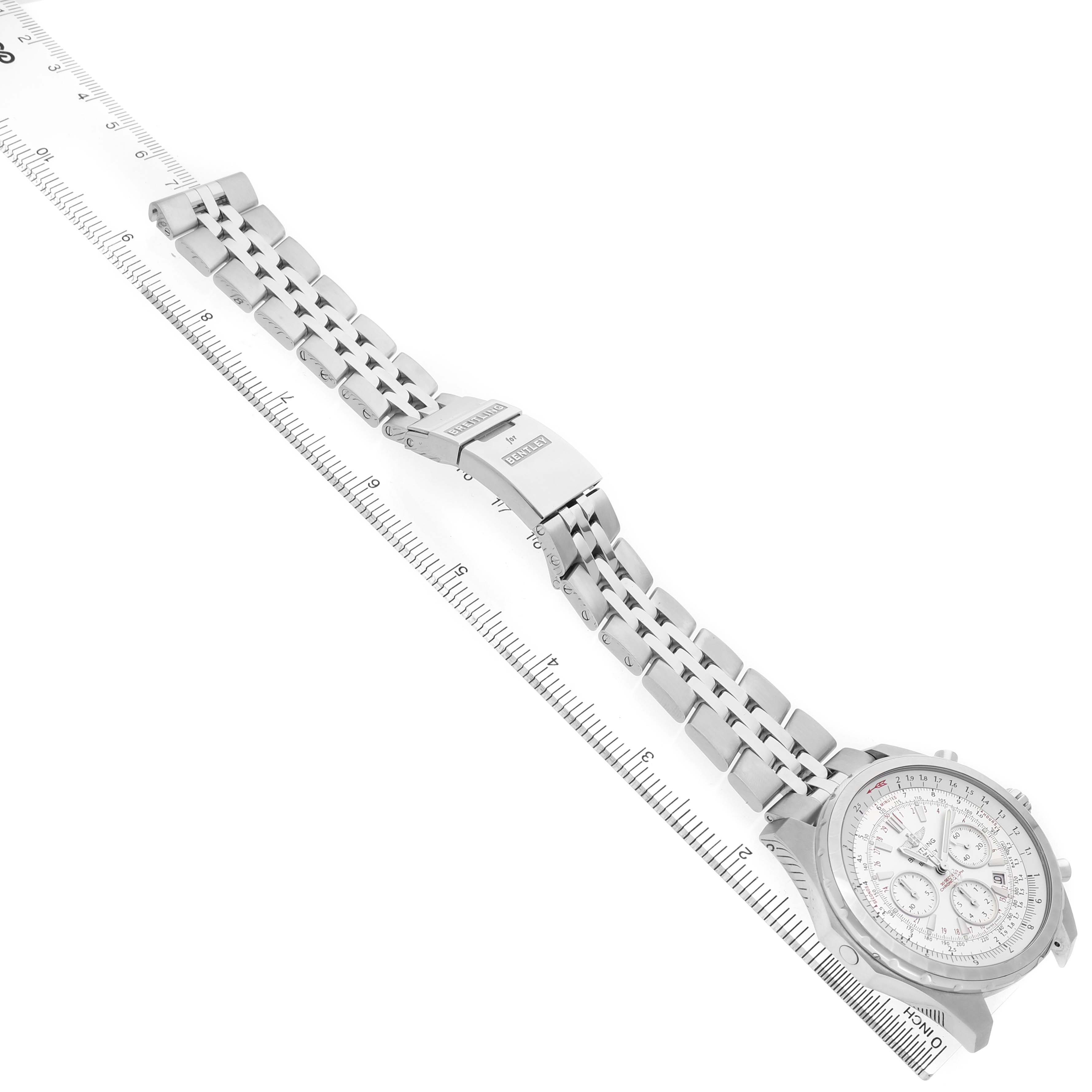 The image shows a Breitling Bentley A25363 Men's Stainless Steel Silver Dial watch at a side angle, highlighting the bracelet, clasp, and face, aligned with a ruler.