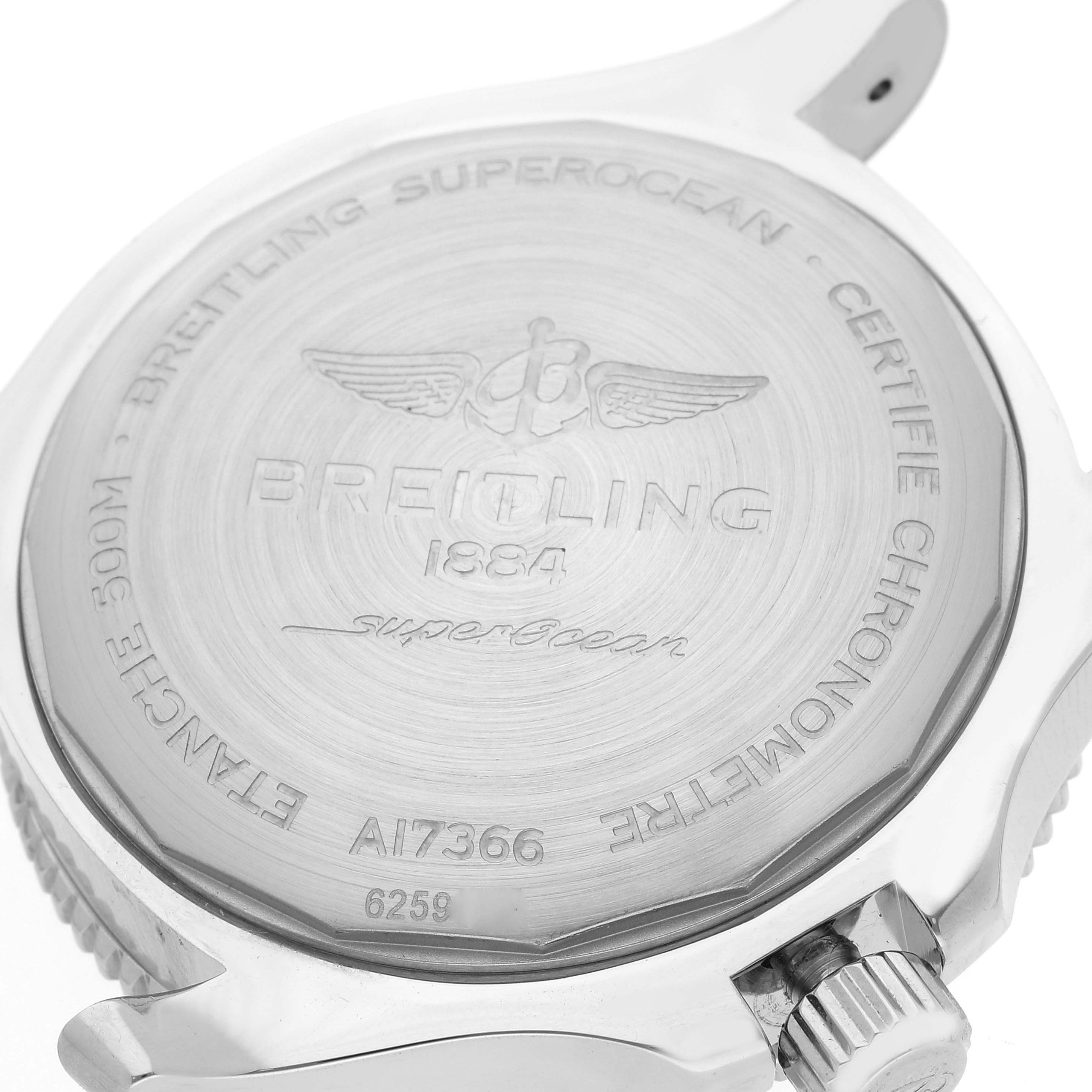 The image shows the back case and crown of a Breitling Superocean A17366 Men's Stainless Steel Black Dial A17366 Men's Stainless Steel Black Dial watch with engraved details.