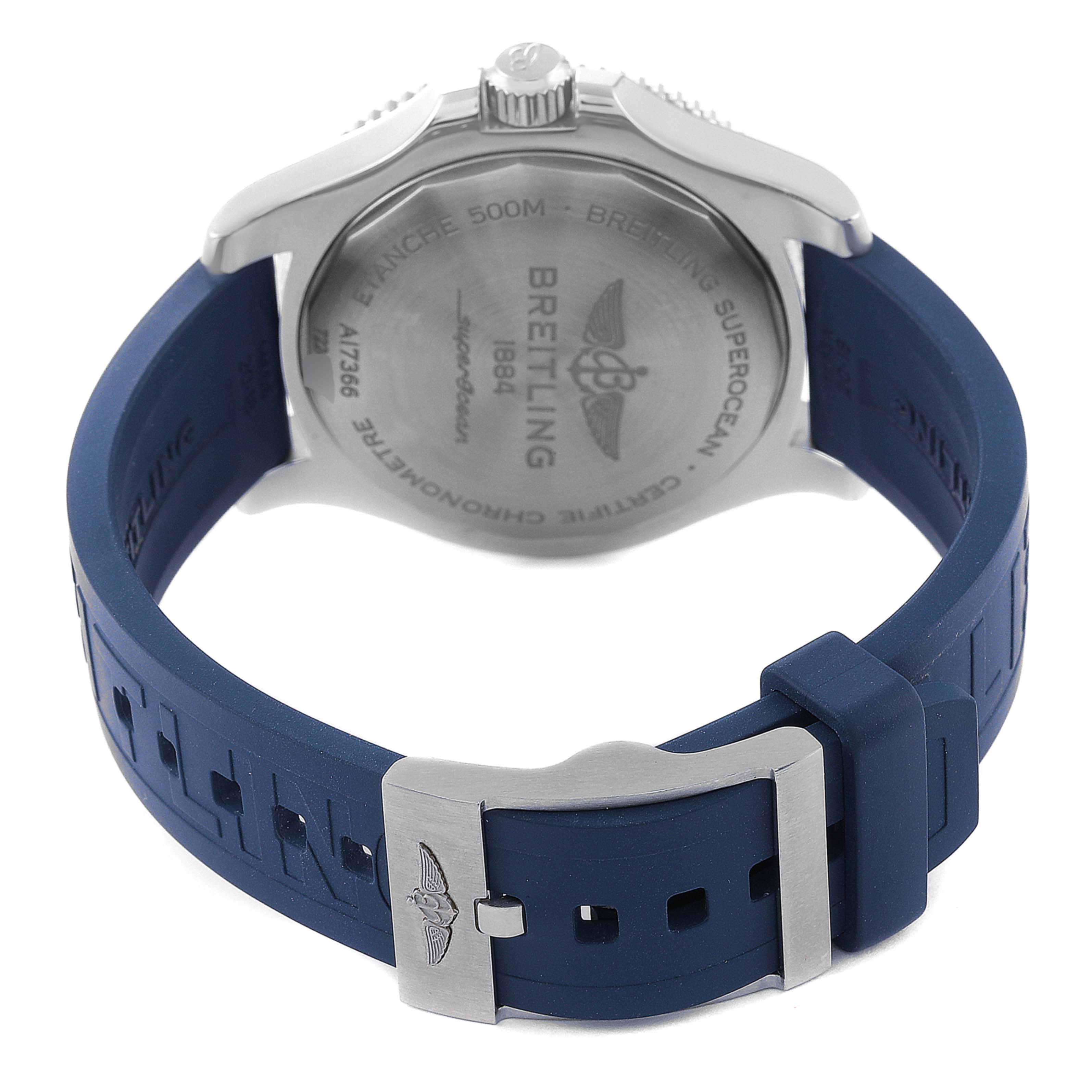 The image shows the back angle of the Breitling Superocean A17366 Men's Stainless Steel White Dial A17366 Men's Stainless Steel White Dial watch, displaying its case back and blue rubber strap with a metal clasp.