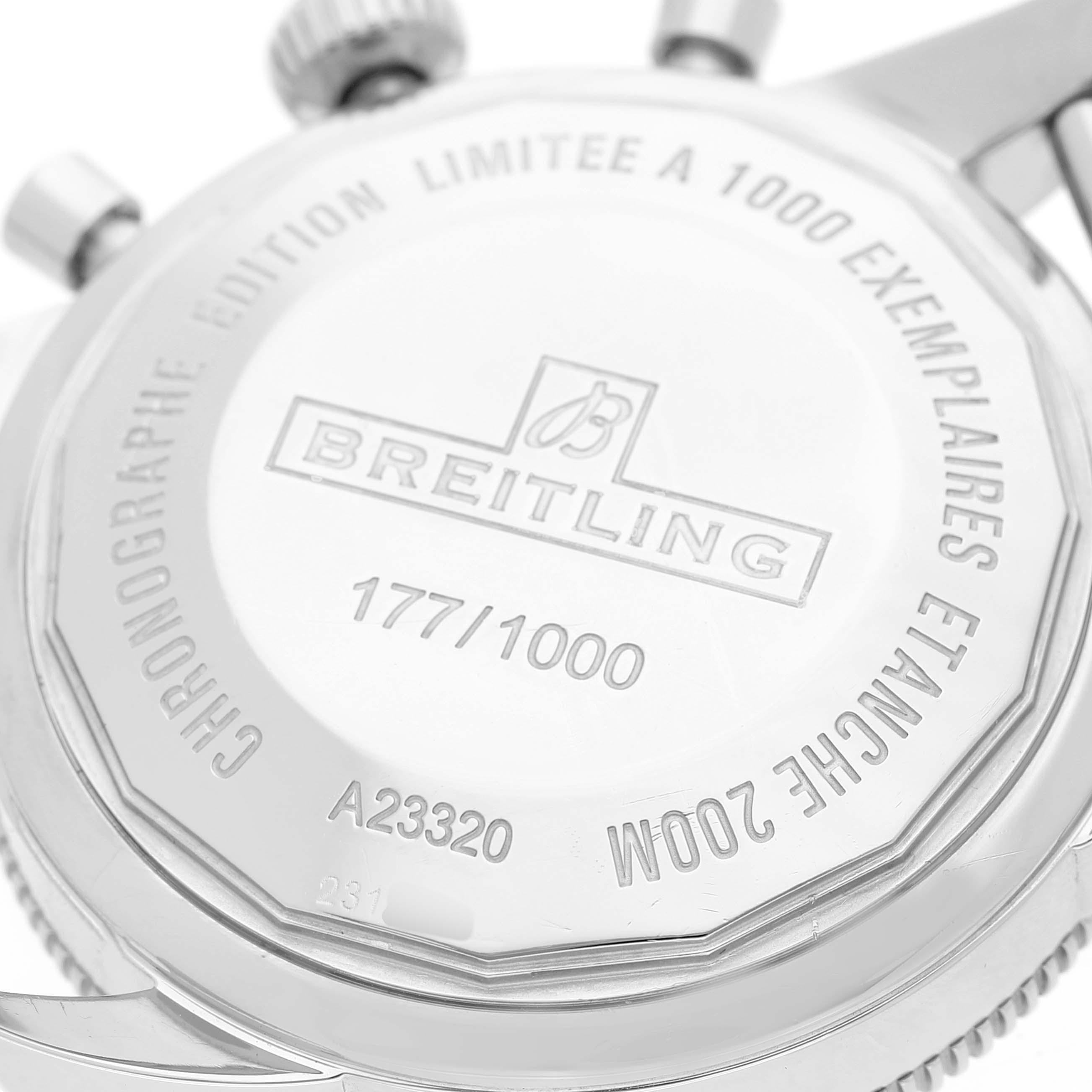The image shows the back case of a Breitling Superocean A23320 Men's Stainless Steel Silver Dial watch, including the brand logo and limited edition details.