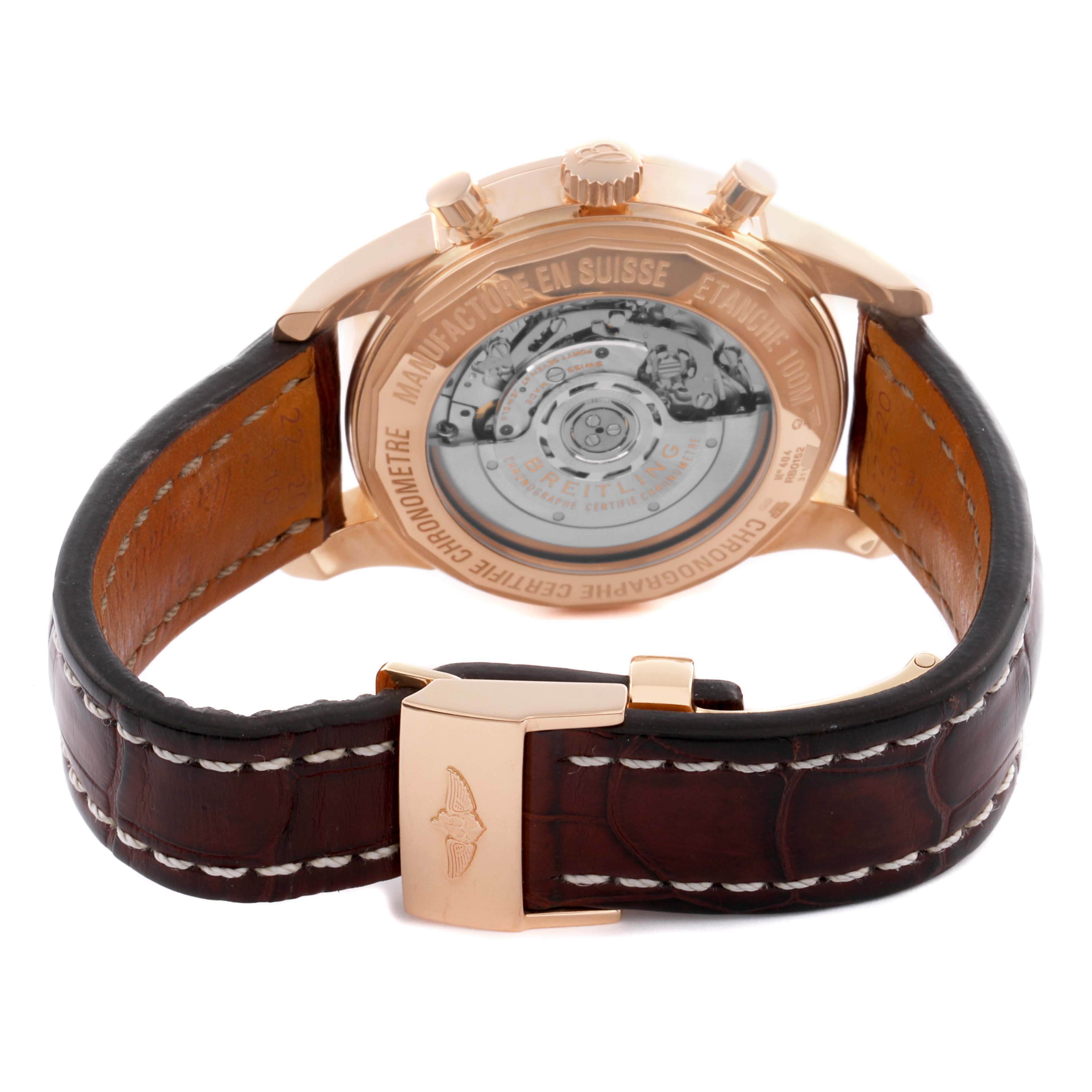 The Breitling Transocean RB0152 Men's Rose Gold Silver Dial RB0152 Men's Rose Gold Silver Dial watch is shown from the back, displaying the movement through the transparent caseback and the leather strap.