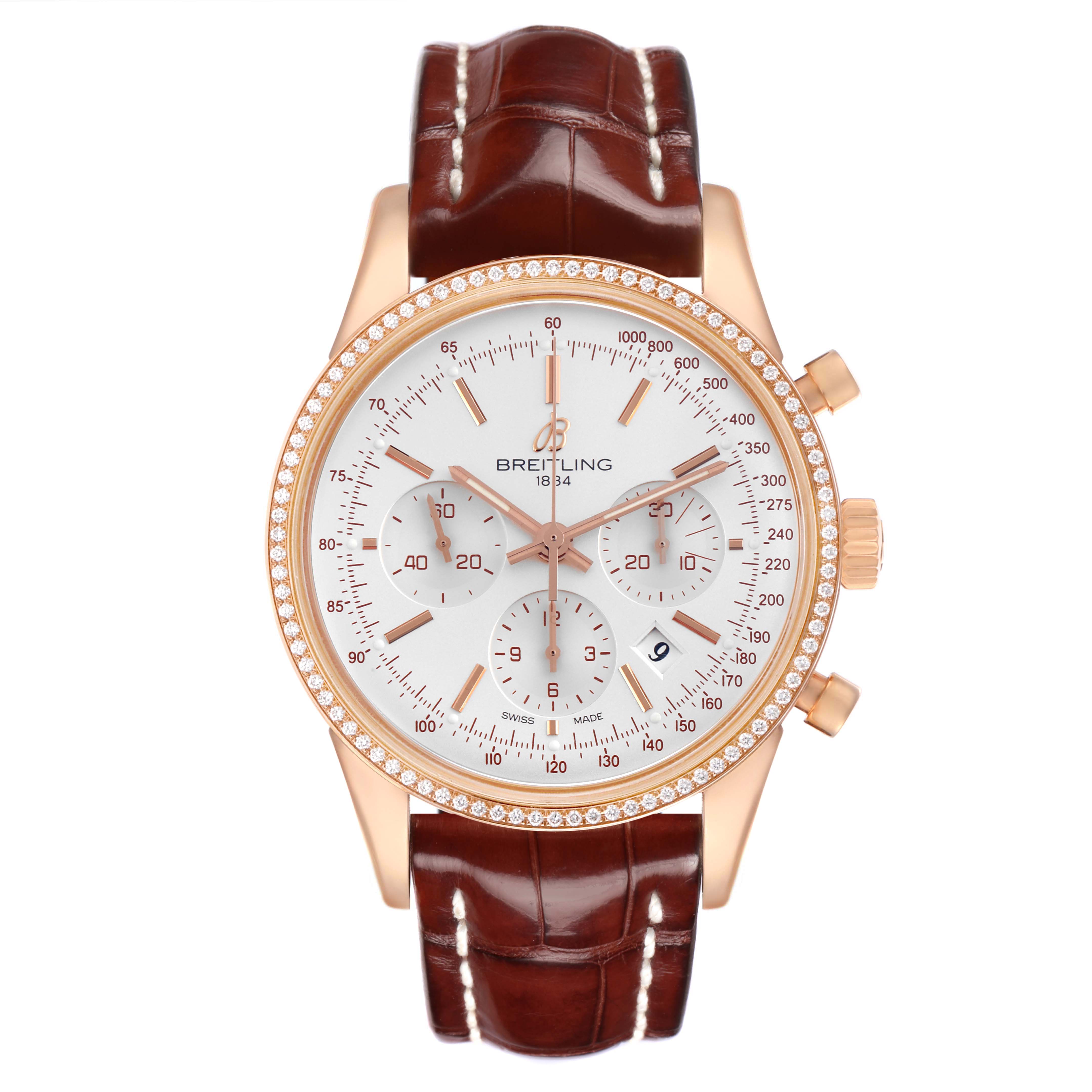 The Breitling Transocean RB0152 Men's Rose Gold Silver Dial watch is shown from the front, highlighting the dial, bezel, subdials, and leather strap.
