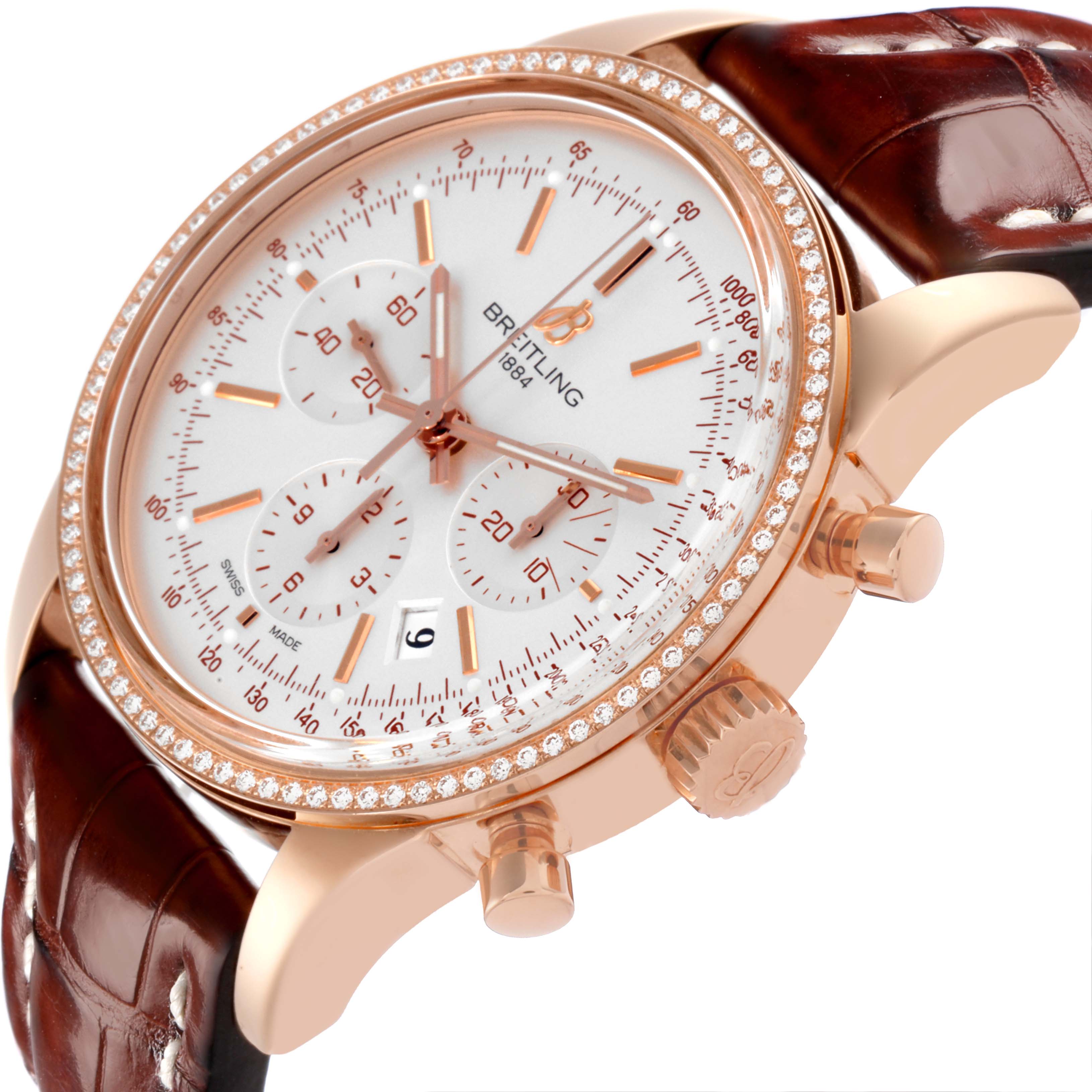 The Breitling Transocean RB0152 Men's Rose Gold Silver Dial RB0152 Men's Rose Gold Silver Dial watch is shown at a three-quarter angle, highlighting the face, bezel, crown, pushers, and leather strap.