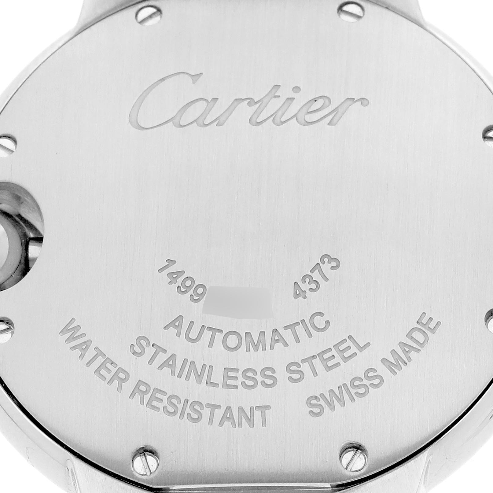 The image shows the back case of a Ballon Bleu by Cartier, highlighting engravings and screws.