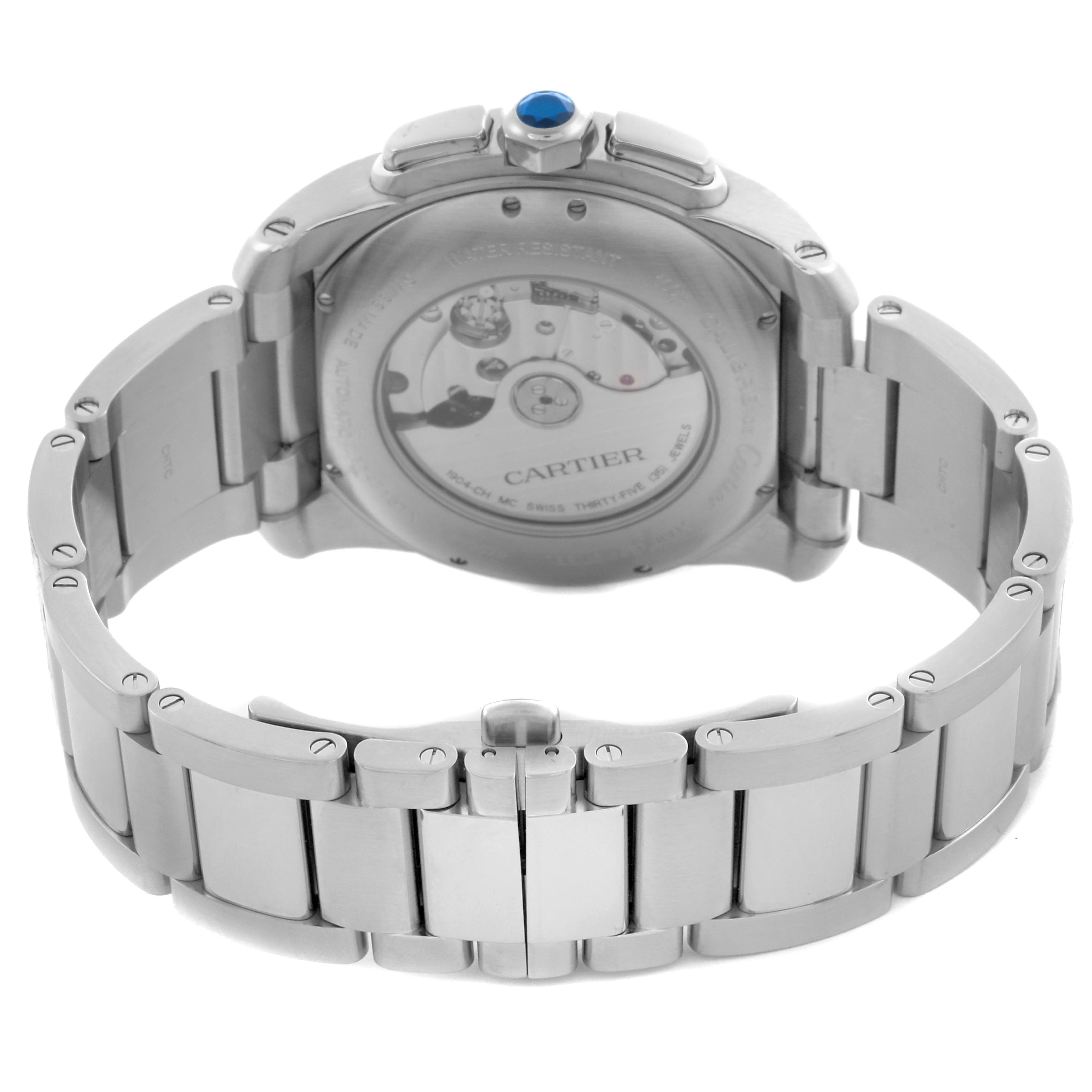 The image shows the back of the Calibre de Cartier watch by Cartier, highlighting the bracelet and case back with the movement visible.