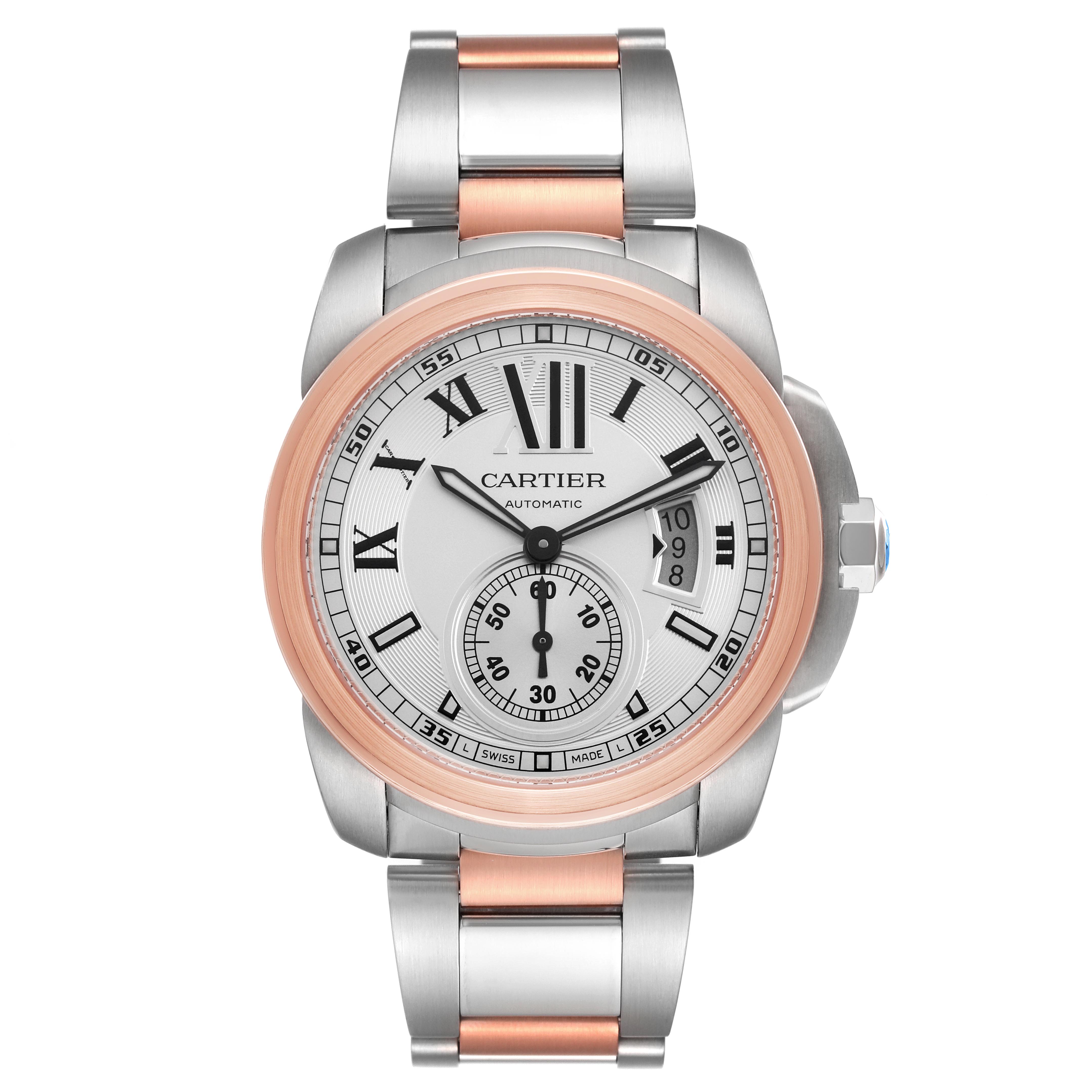 The Calibre de Cartier watch is shown from a front angle, highlighting its face, bezel, and bracelet.