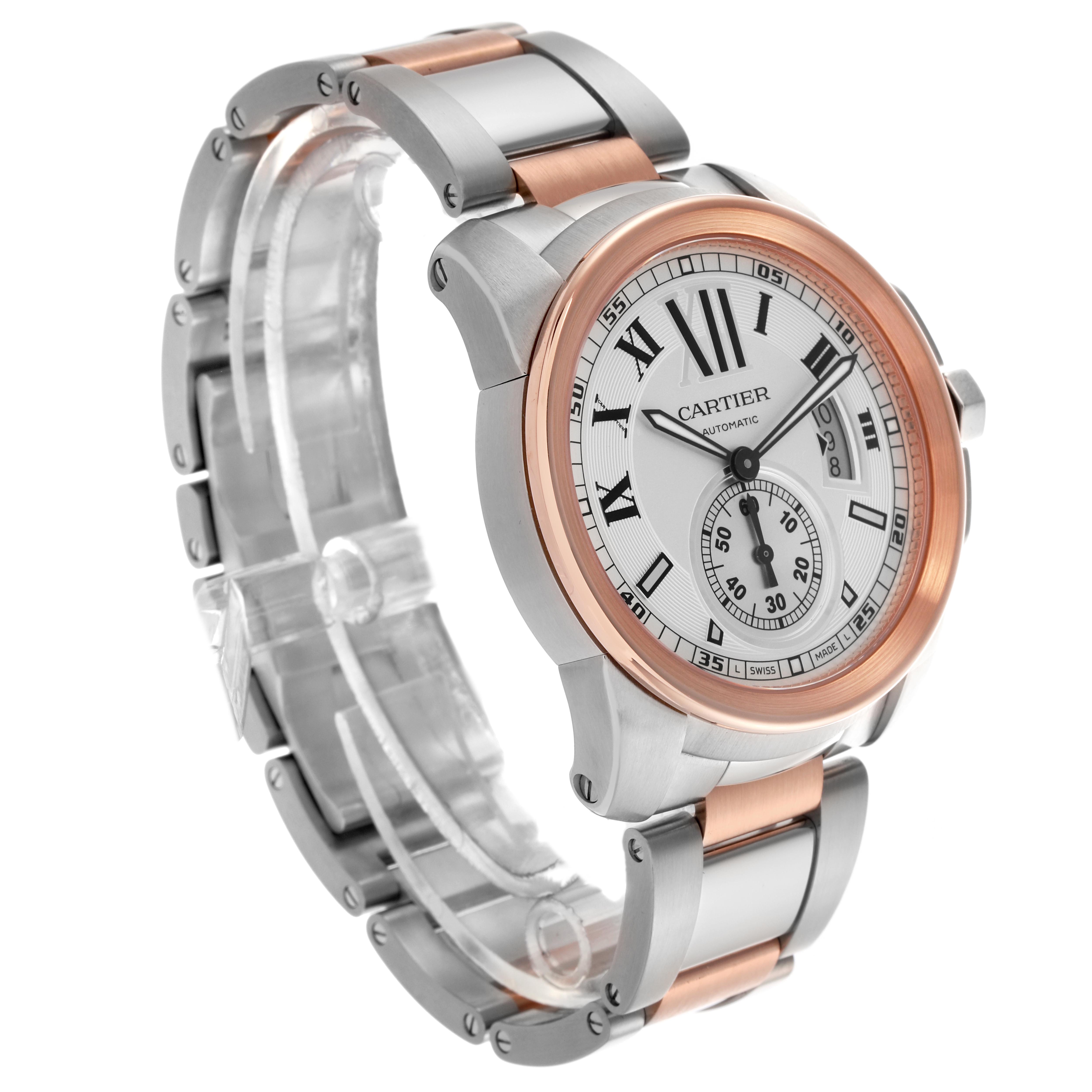 The Calibre de Cartier watch is shown at a three-quarter angle, highlighting the bezel, dial, and metal bracelet.