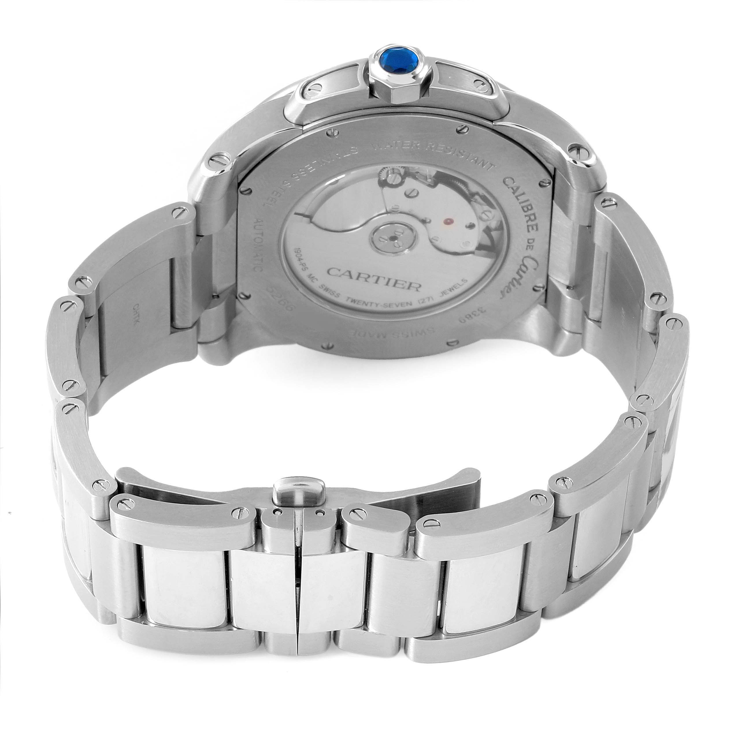 The image shows the back view of the Calibre de Cartier watch, highlighting its stainless steel case and bracelet.