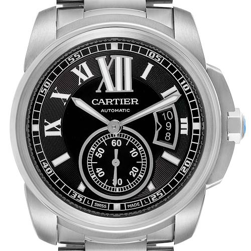 The image shows a front view of the Calibre de Cartier watch, highlighting the dial, hour markers, hands, and date display.