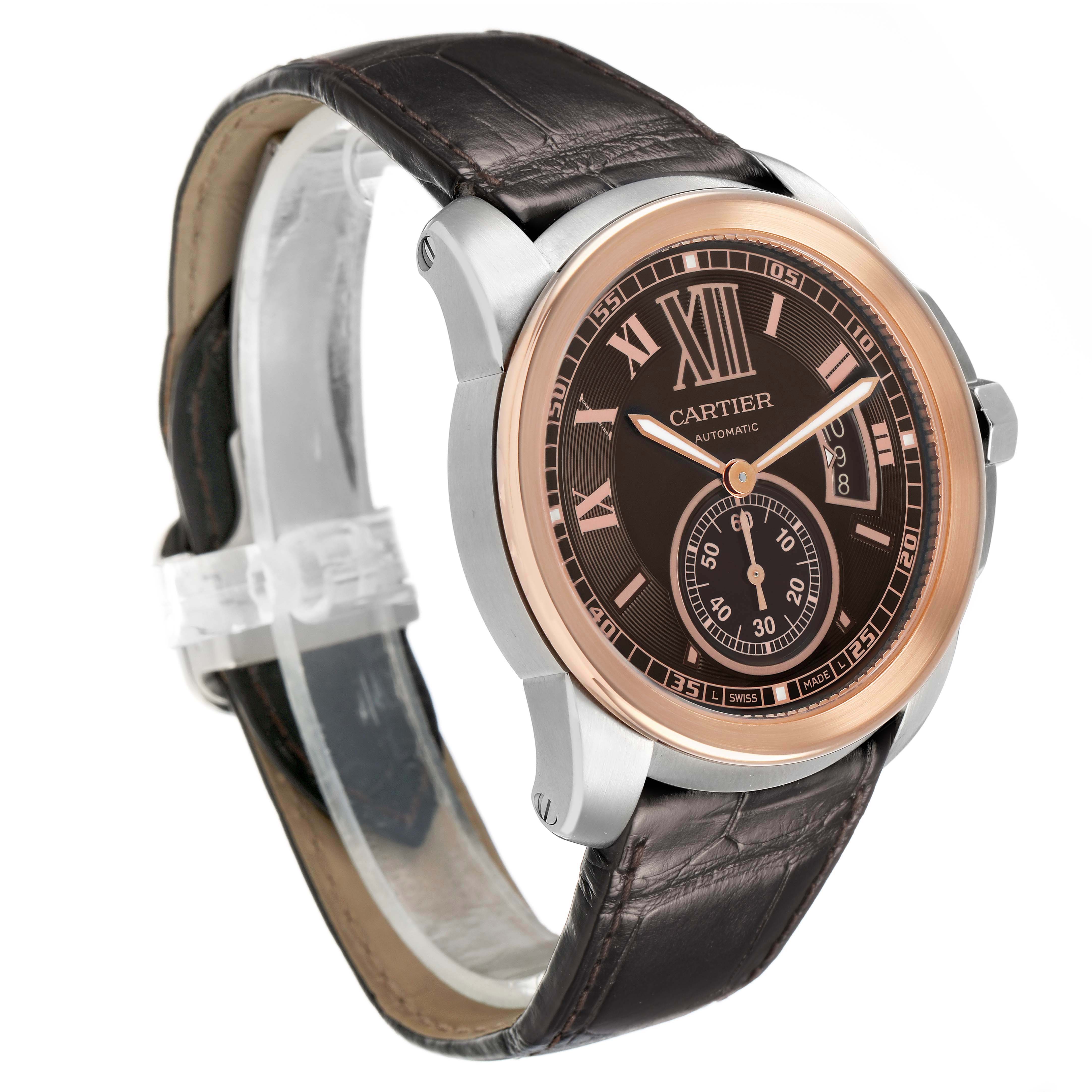 The Calibre de Cartier watch is shown at a three-quarter angle, displaying the face, bezel, case, and leather strap.